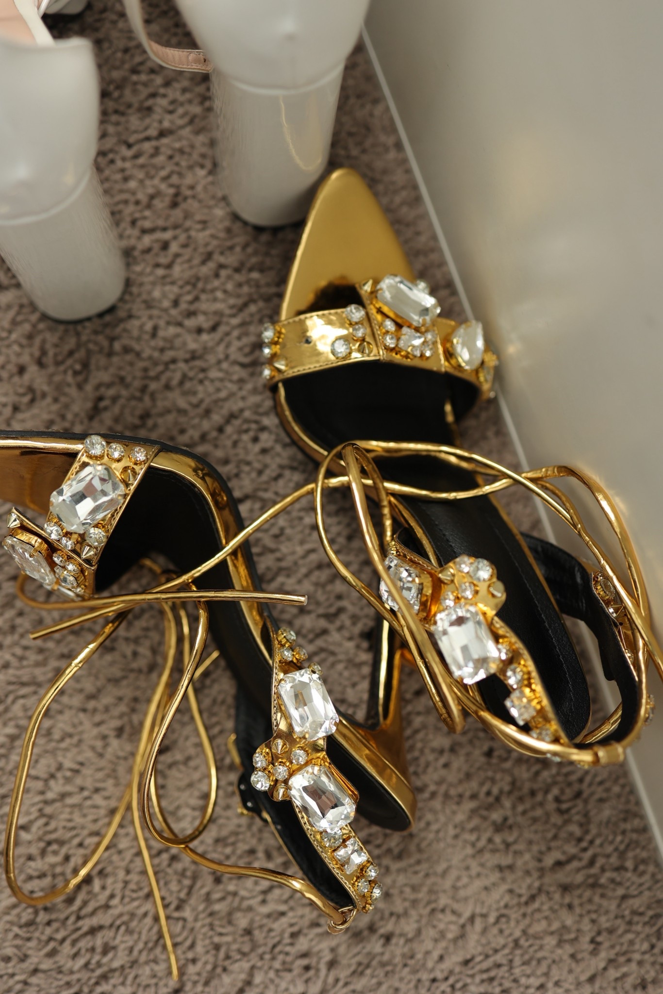 Gold heeled pump, perfect for date night or special occasions. 

