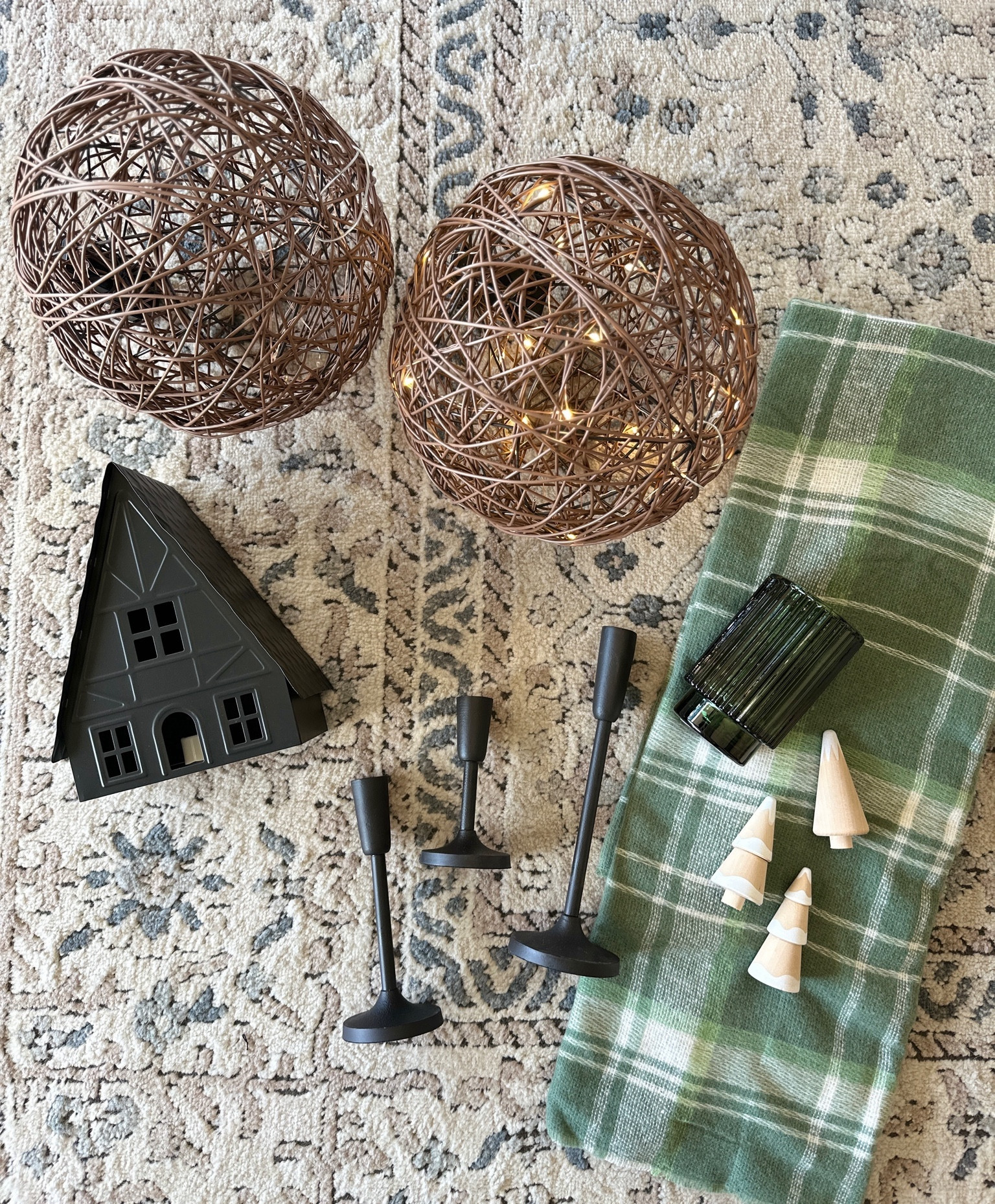 🌲Holiday decor I couldn’t pass up!
1. Prelit Orbs- perfect to add texture and light for your front door.
2. Black Tin House- battery operated light. Love the ski chalet look of this one.
3. Set of 3 Modern Candlesticks- slick and simple. Also comes in gold. 
4. Mercury Glass Candle- love this deep shade of green
5. Mini Wooden Trees- comes in 3 versions
6. Blanket/Scarf- I love the color and print and actually use it to drape over chairs. Adds color and texture.

#holidaydecor #winterdecor #holiday #homedecor #christmasdecor #target #modernfarmhouse #modernfarmhousedecor #christmas

#LTKSeasonal #LTKhome #LTKHoliday