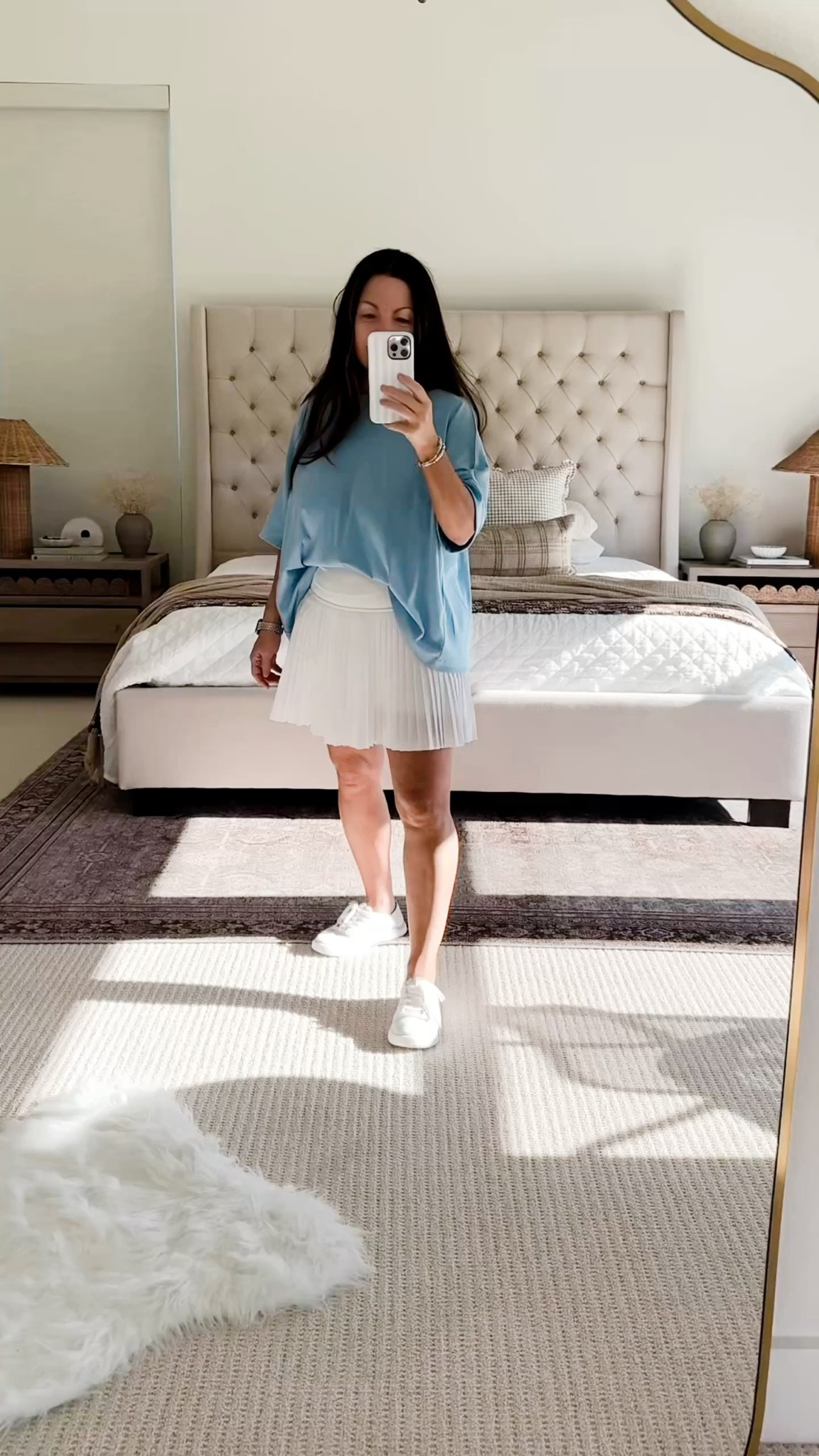 Easy everyday summer outfit that’s perfect for running errands, mom life, or just staying comfortable but put together #affiliate
This oversized blue tee is so soft and easy to style and I love it paired with this white pleated skort (looks like a skirt but has built-in shorts 🙌). Pleated skort  Finished it with simple white sneakers for a clean, casual look you can wear all day.

Sizing details + all pieces linked for you 🤍 Follow me on LTK for daily outfit ideas, Amazon finds, and home decor inspiration

#LTKPetite #LTKootd #LTKvlog