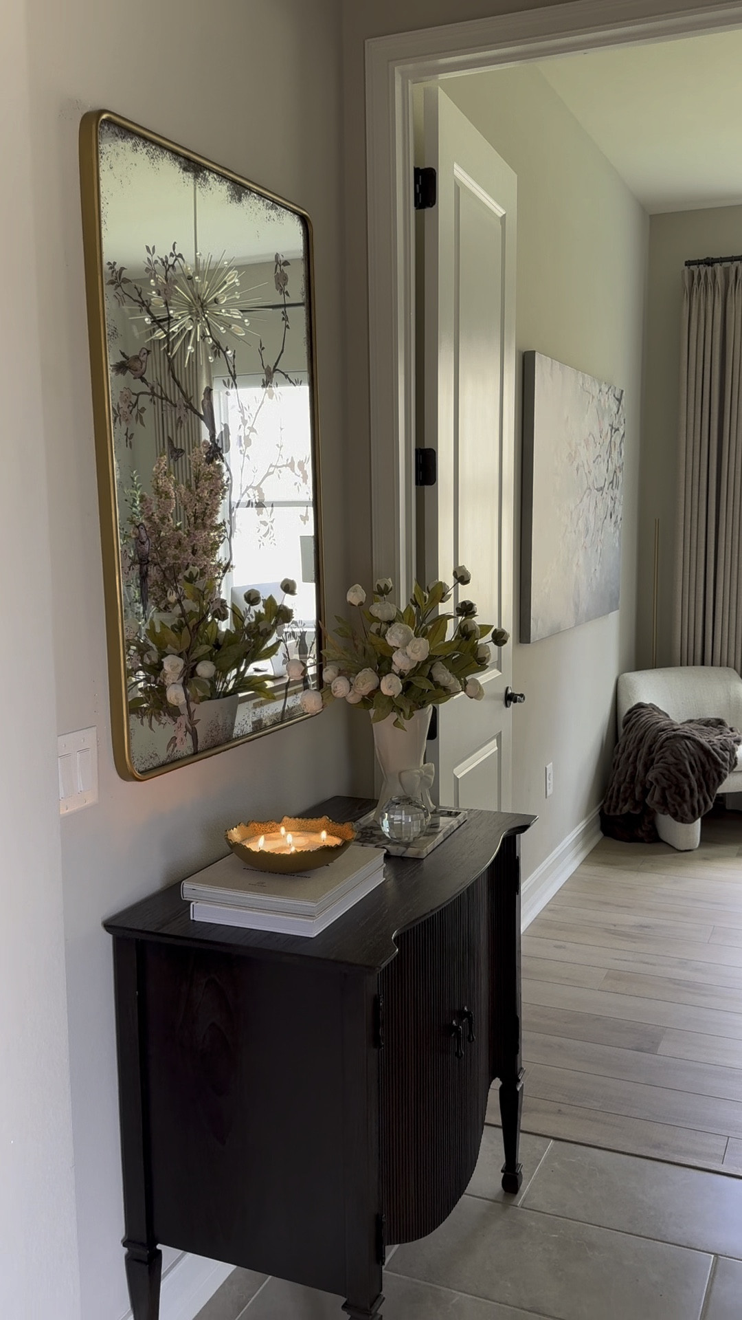 This area needed a refresh. It’s a space you see when you first walk in the door and I just really wasn’t happy with the way it looked. When I found this beautiful piece of furniture from Arhaus, I knew it was the perfect piece for this space. 

Arhaus, fluted cabinet, Amazon home decor, Michael’s peonies, marble tray, entryway decor, Conrad hall chest

#LTKfindsunder100 #LTKVideo #LTKhome