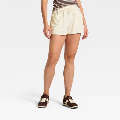 Women's Mid-Rise Fleece Pull-On Shorts - Universal Thread™ Cream XS | Target