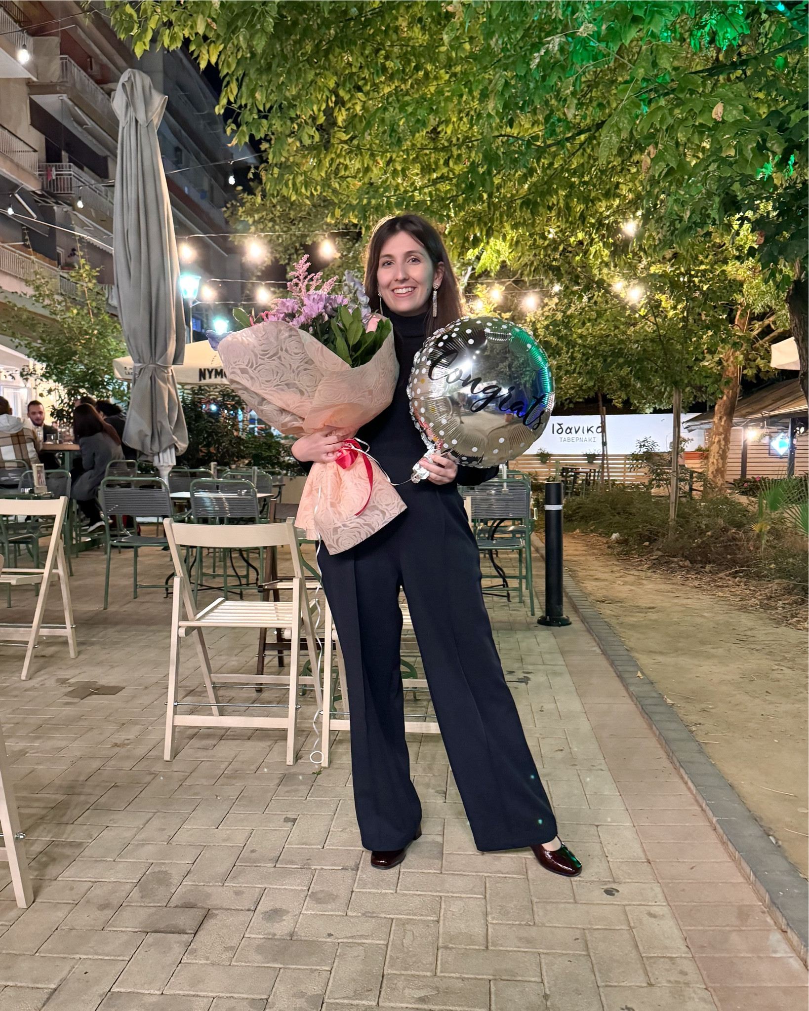 One of the days I was in Greece my friends surprised me with flowers, ballons and the tastiest cake to celebrate a work success 🥹 We went out for drinks to celebrate but I didn’t expect them to bring all these things 🥹 I love them so much! ❤️ I took a photo with my brother as well because without his (and my boyfriend’s) support I wouldn’t have done it ❤️ I feel so lucky to be surrounded by amazing people 🥹
I wore a total navy blue outfit with burgundy shoes, a beige trenchcoat and a pink bag. The trenchcoat was the only outerwear I had with me and that night was very much needed! For jewellery I opted only for my gold Chanel earrings. 

#LTKeurope #LTKautumn #LTKshoes