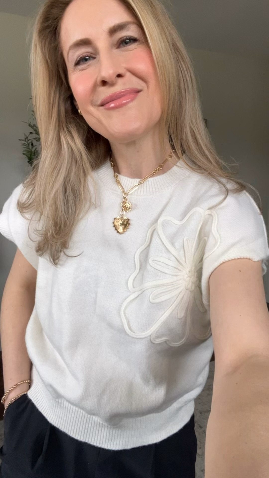 Amazon sweater that’s soft and unique, not the best quality (the petal is coming off!) but worth it if you can find on deal. Lots of colors. I misspoke; I’m actually wearing a size medium so I went up one size. #amazonfinds 

#LTKOver40 #LTKWorkwear