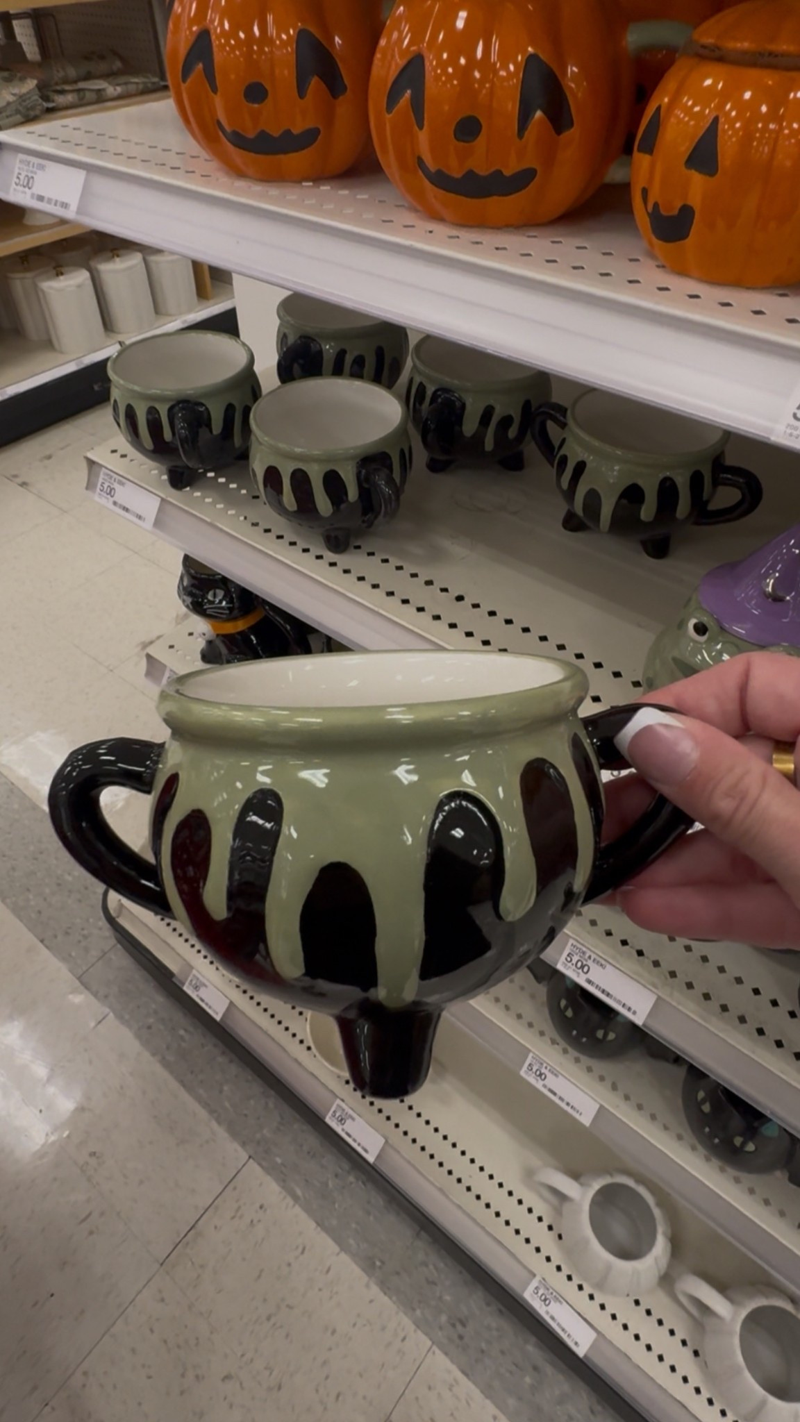 Nothing screams cozy Halloween vibes like sipping coffee from a cauldron ☕🧙‍♀️ I linked this exact $5 cauldron mug on my LTK so you can snag it too!
