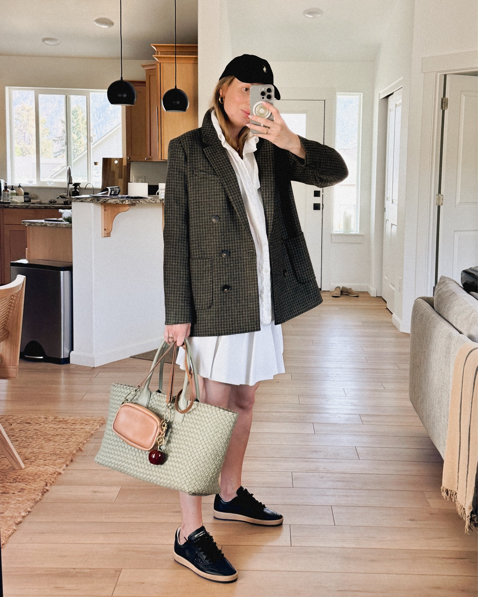 Taking for a walk a few new finds:
- Golden Goose ball star sneakers in black nappa leather and glitter
- Polo Ralph Lauren relay blue baseball cap
- Sézane houndstooth blazer in 100% wool
- Coach bag charm (small apple 🍎) 
Styling them with my Lacoste tennis skirt, Gap oversized linen shirt, Bottega Veneta Cabat bag in travertine & Madewell carabiner bag in warm hickory. 


#LTKStyleTip #LTKWorkwear #LTKSeasonal