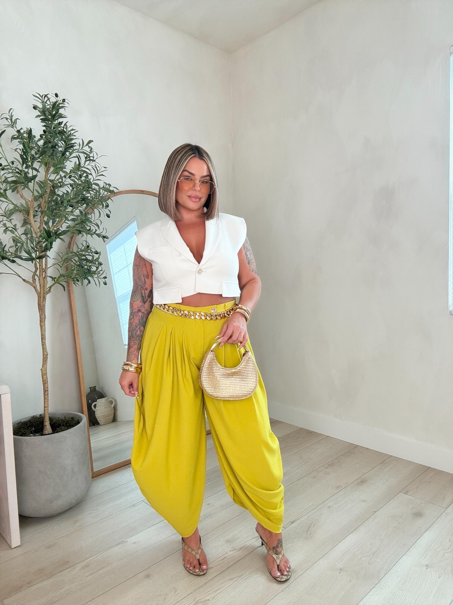 Vest top is old but linked 2 very similar options for you. 

The anthro one I linked I actually tried on in store in a size L and it fit just like the one I’m wearing. 

Pants xl they come in tons of colors 

Belt is old also linked similar options. 

Linked exact shoes as well as a similar more affordable option.