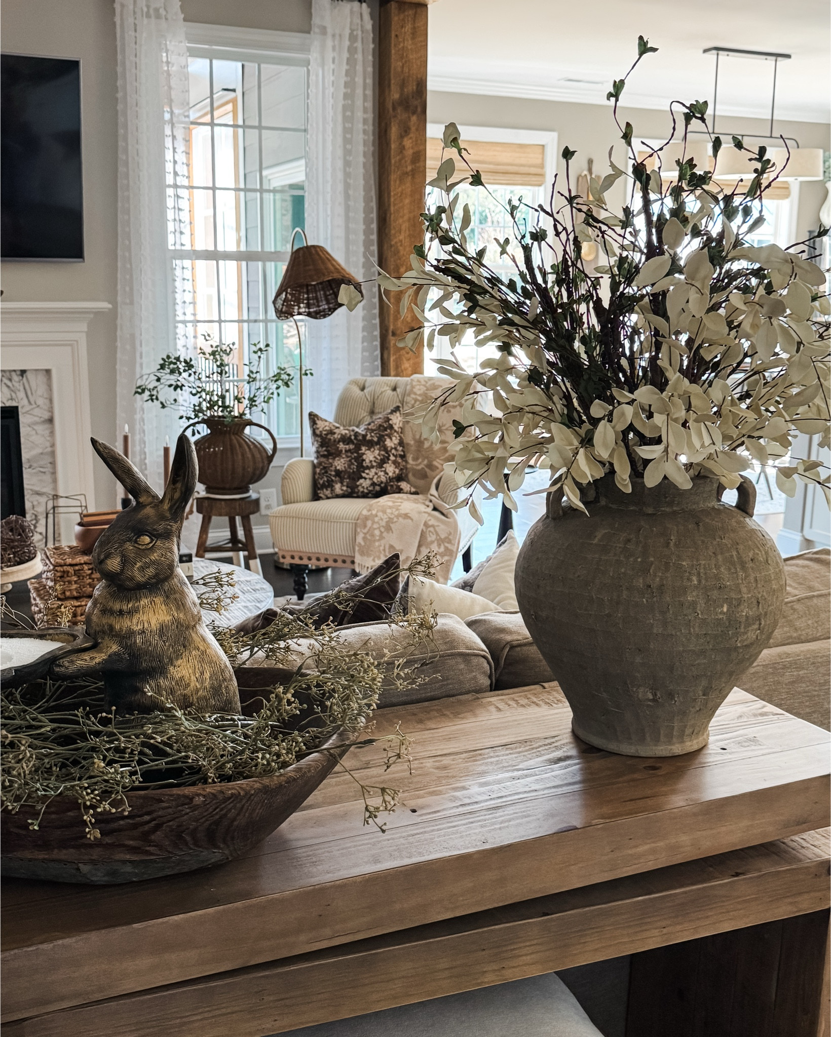 Friday Photos of my Spring Home

Console table, spring florals, woven vase, greenery, floral throw pillow, floral throw blanket, round coffee table, woven storage boxes, black candle holders, rabbit snuffer, vintage looking magnifying glass, pineapple snuffer, floor lamp with woven shade, upholstered chair, dusty plum stems, gold lantern, diamond print rug, island pendants, tall flameless candle, large taupe vase, spring stems, artichokes, chandelier, bronze bells with stands, cabbage roses, vintage wood vase

#LTKstorytime #LTKSeasonal #LTKHome