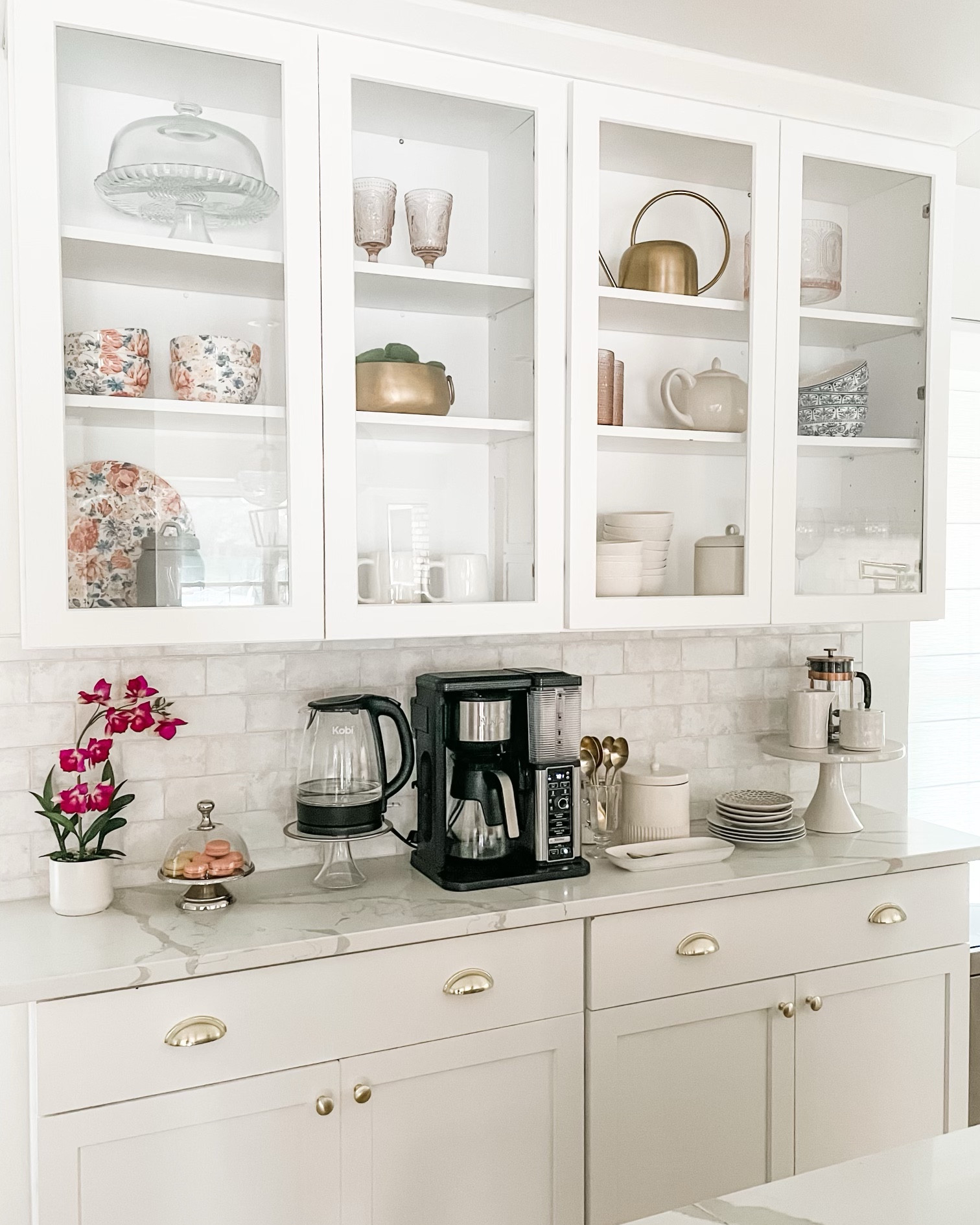 Spring refresh on this beautiful coffee bar! 

Just add in a few seasonal decor pieces, serve ware and some fresh spring flowers to create a whole new look. Scroll to the next slide to see it styled for fall. 🌷🌸🌺

**Ninja coffee maker is on sale!**

#LTKsalealert #LTKSeasonal #LTKhome