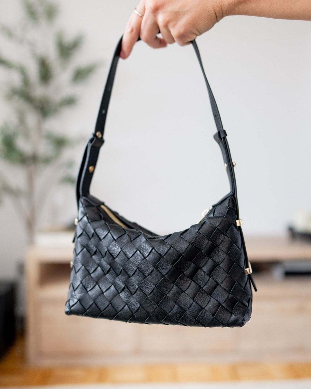 The woven black leather bag that instantly makes an outfit feel more expensive. Sleek, minimal, and easy to wear from everyday errands to dinner.

black woven bag, leather shoulder bag, Quince handbag, quiet luxury, everyday purse, designer inspired bag, classic black bag, fall accessories, minimalist style, elevated basics

#LTKSeasonal #LTKTravel #LTKWorkwear