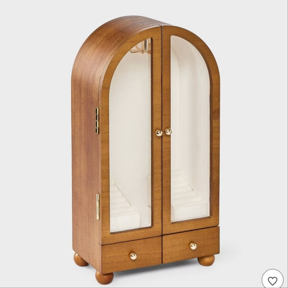 Fit & styleStylish arched open display cabinet, 13.58 inches heightWarm brown color for a classic lookCrafted from medium-density fiberboardOpen design for easy access to jewelrySingle compartment for focused organizationWipe clean with a soft cloth for care

#LTKHome #LTKFindsUnder50 #LTKGiftGuide