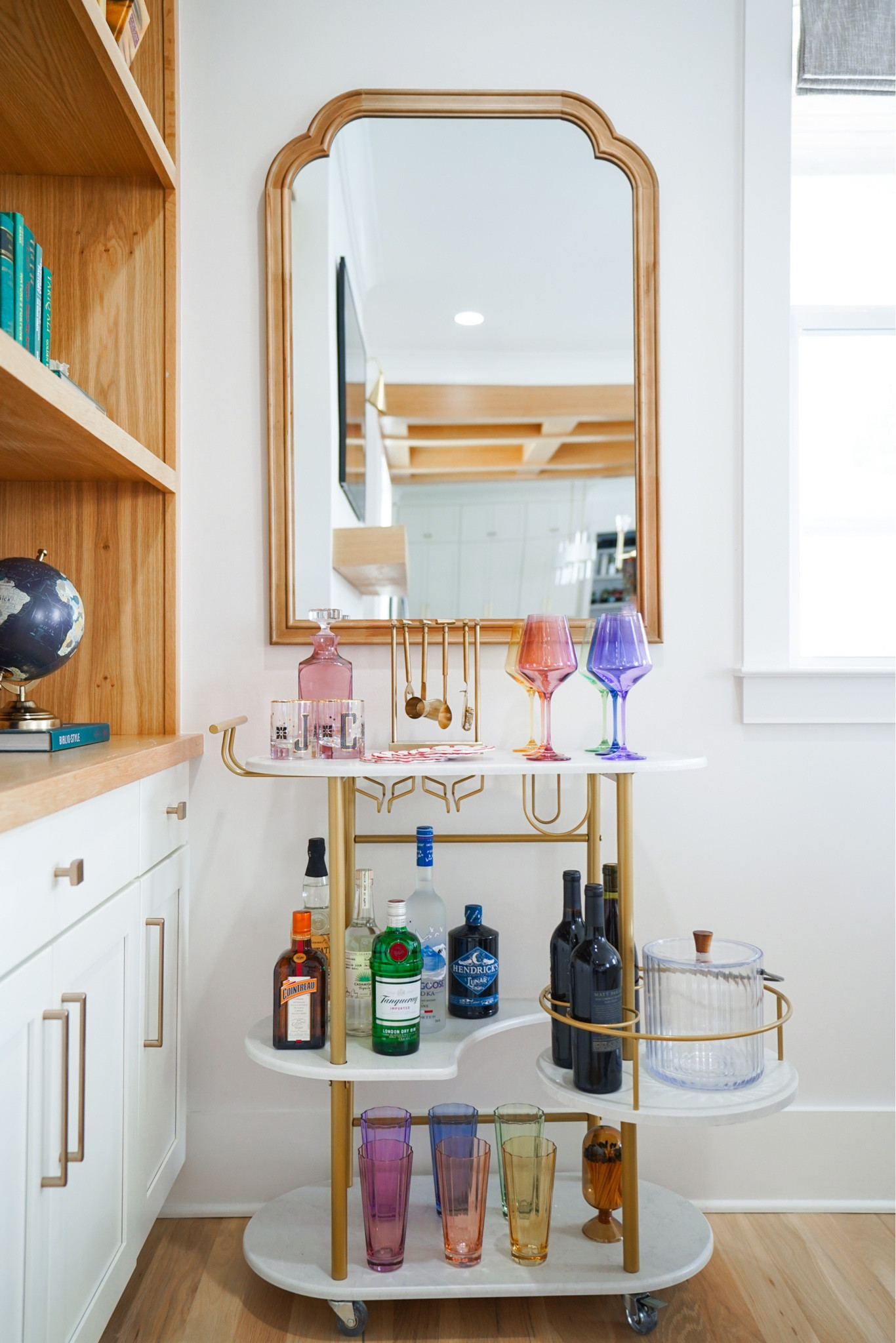 Tips for small space entertaining! A bar cart with wheels is perfect for entertaining in multiple areas of your space. Simple finishing touches like these colorful glasses elevate the space!

#LTKSeasonal #LTKhome