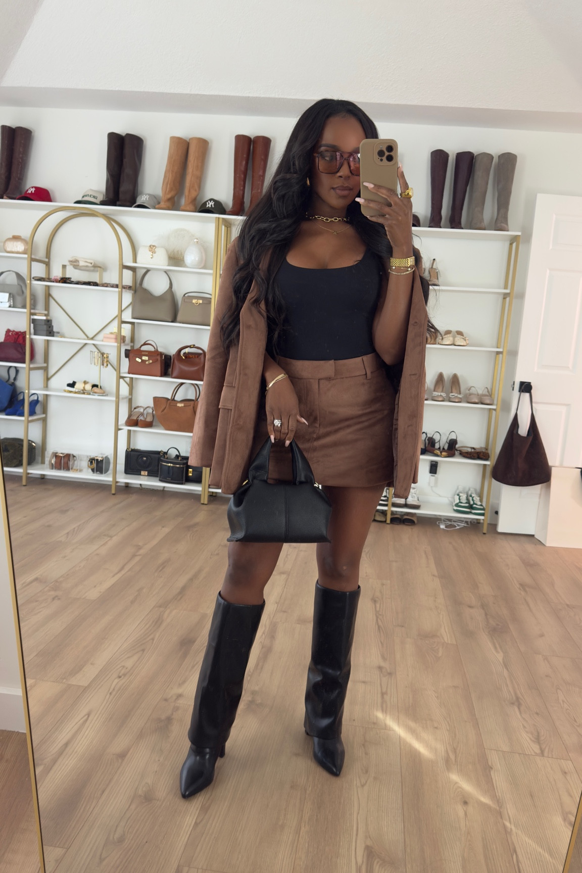 Effortlessly Chic in Suede ✨

This brown suede skirt & blazer set is serving luxe, timeless vibes! Paired with a sleek black tank, knee-high boots, and a designer-inspired dumpling bag—this look is a must-have for your wardrobe. Style it up or down, but either way, you’ll turn heads!

Wearing Size Small (6) for reference. Would you rock this set? Let me know in the comments! ⬇️

#FashionTrends #OOTD #StyleInspo #WardrobeGoals #ChicAndTrendy #FallFashion #WinterStyle #NeutralAesthetic #StreetStyle #Trendsetter #OutfitIdeas #FashionBlogger #StyleGoals #InstagramStyle #LuxuryFashion #ClassyLook #ExplorePageReady #TrendingNow #ShopTheLook #DiscoverFashion #SuedeStyle