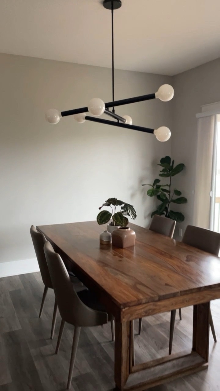 This chandelier from West Elm makes the perfect statement in our dining room. 30” in antique bronze (looks like black) - under $500! We searched and searched for one & LOVE it. #diningroom #diningtable #diningchairs #chandelier #westelm #homedecor 

#LTKhome #LTKFind
