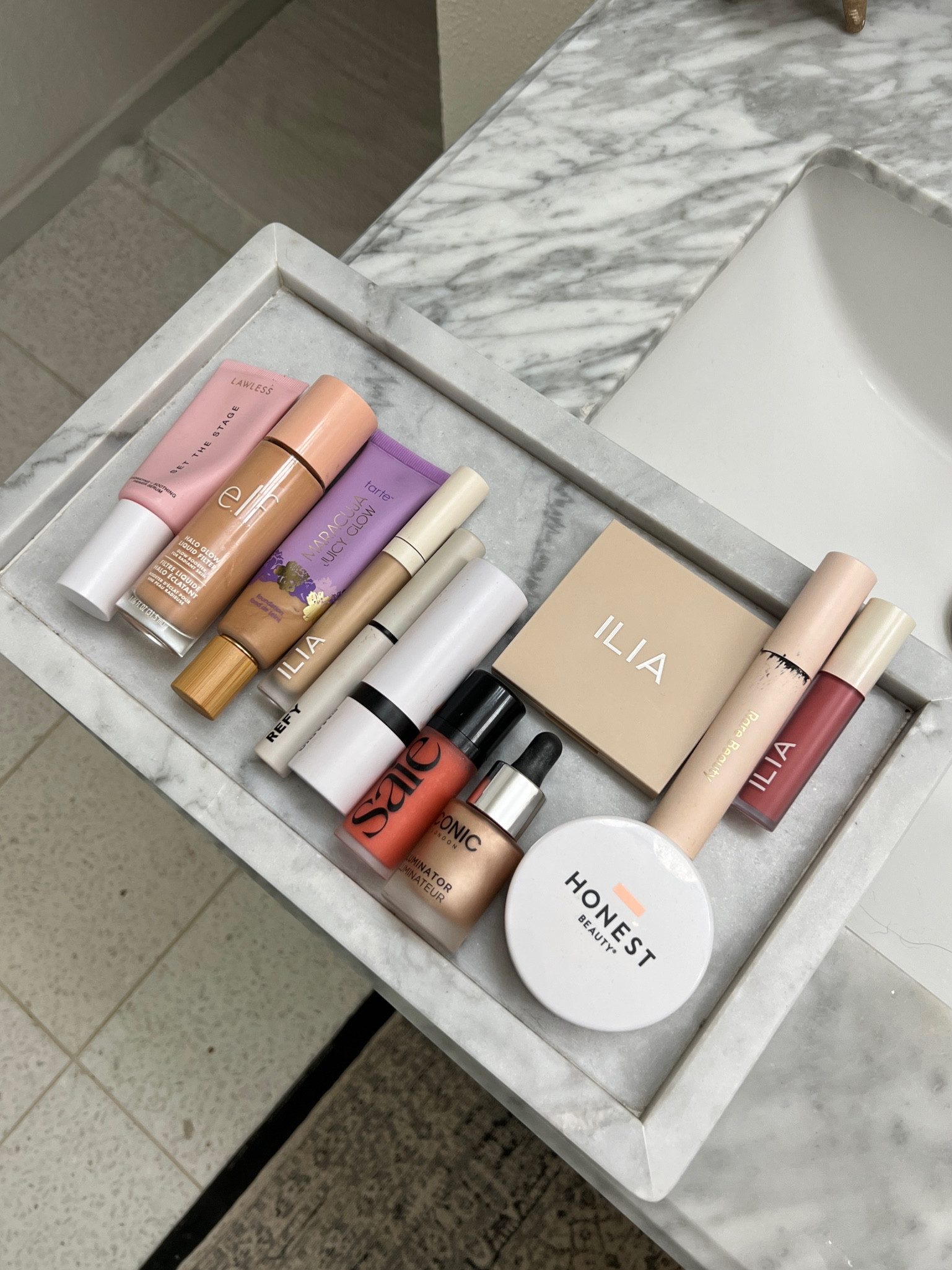 makeup products from my reel! My everyday glowy clean girl makeup routine for Summer 

Shades: 
foundation: light neutral 
Saie blush: poppy
Concealer: chicory 
Ilia lip oil: only you

#LTKbeauty