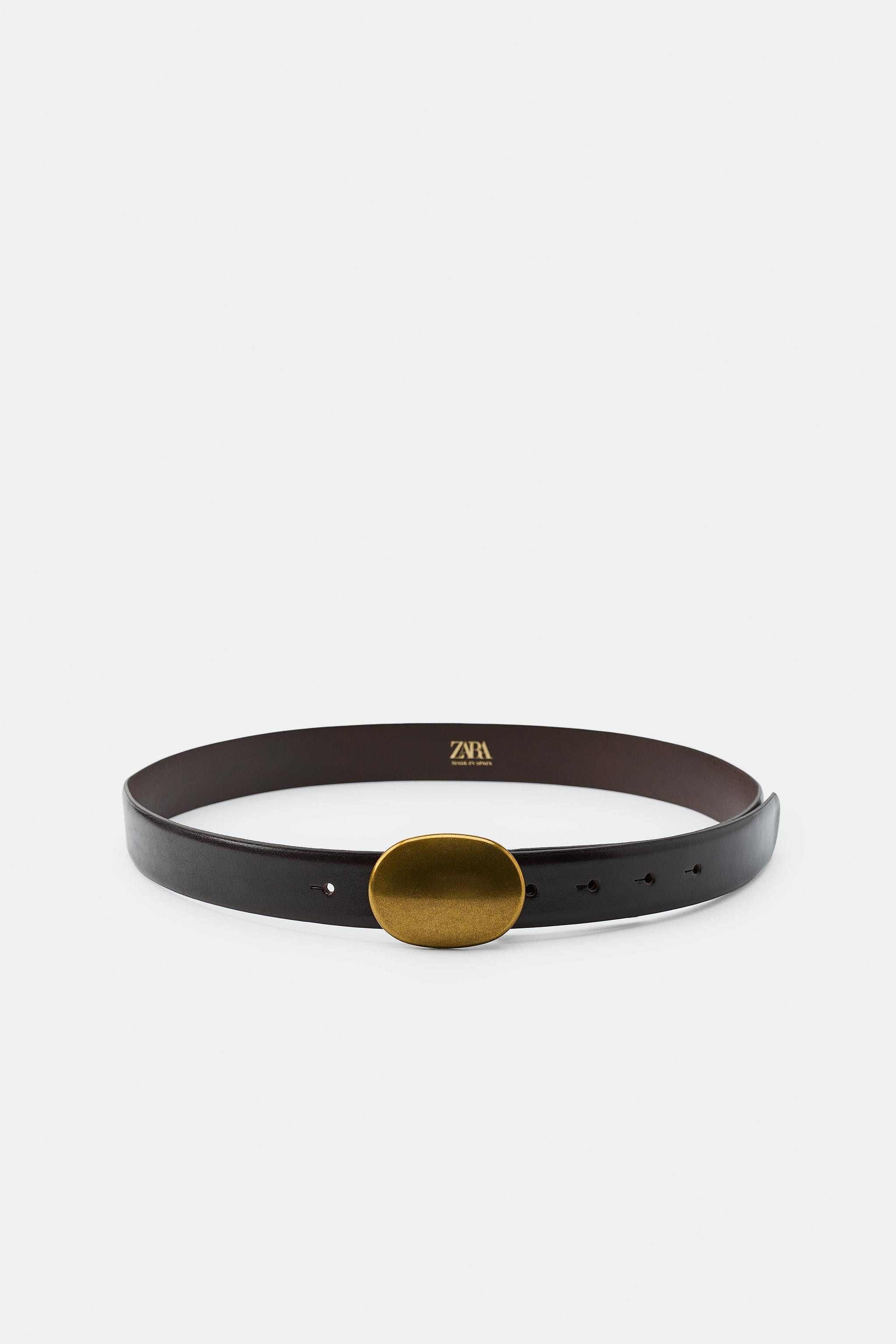3 cm wide belt crafted from 100% leather. Oval-shaped metal plate buckle. | Zara UK