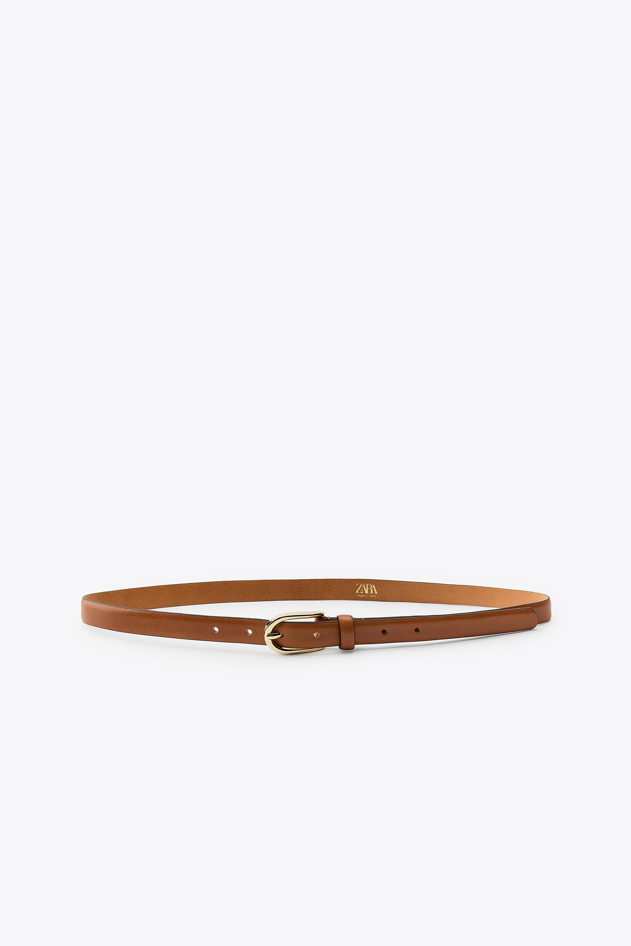 2 cm wide leather belt. Oval metal buckle. | Zara US