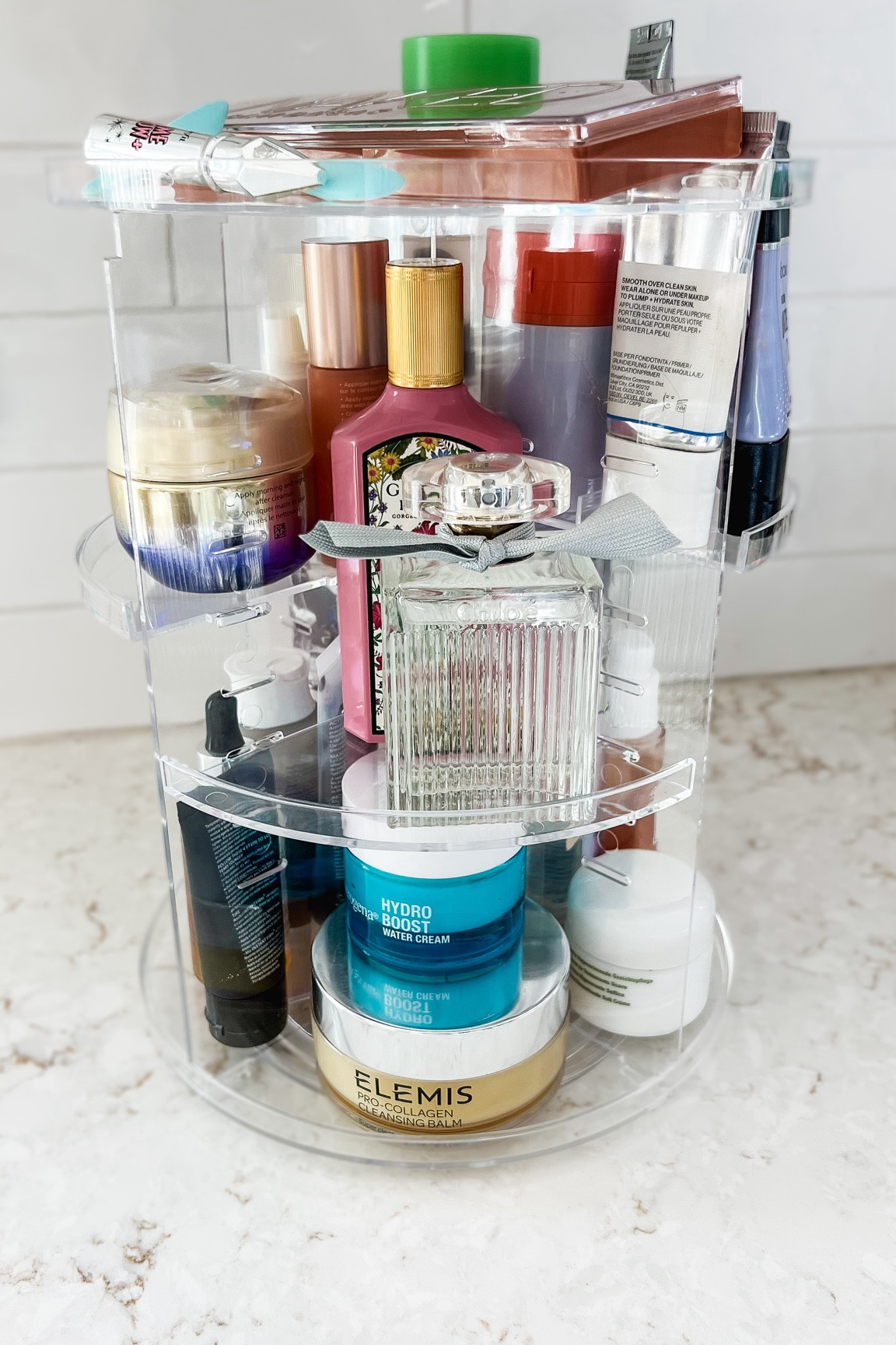 This rotating mAkeup organizer is a must if you are looking to save some counter space. #beautyhacks #organization 

#LTKover40 #LTKkids #LTKbeauty