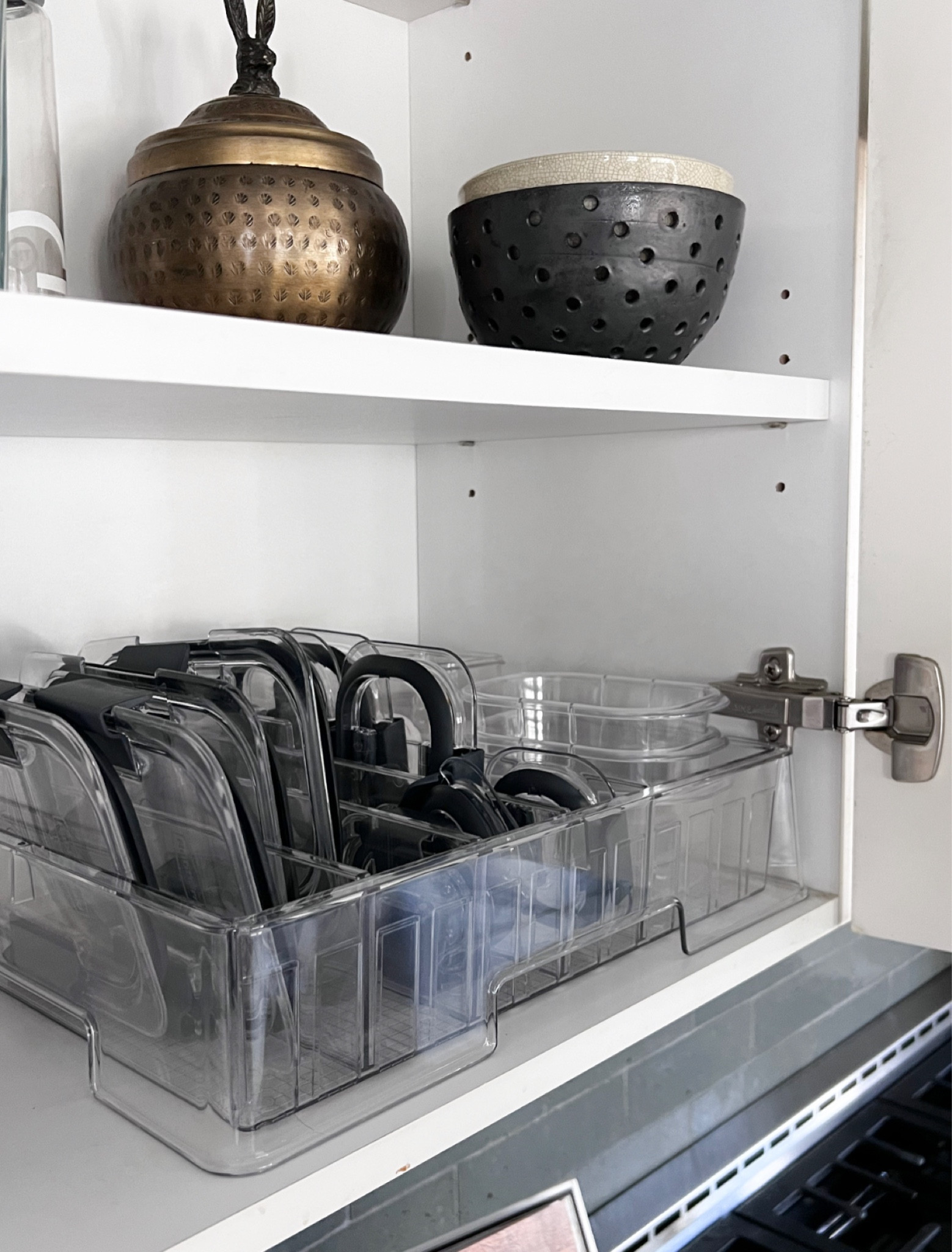 How cool is this food storage lid organizer?! Finally an easy way to keep it all together (no more kids falling out of the pantry!)

#LTKSeasonal #LTKfindsunder50 #LTKhome