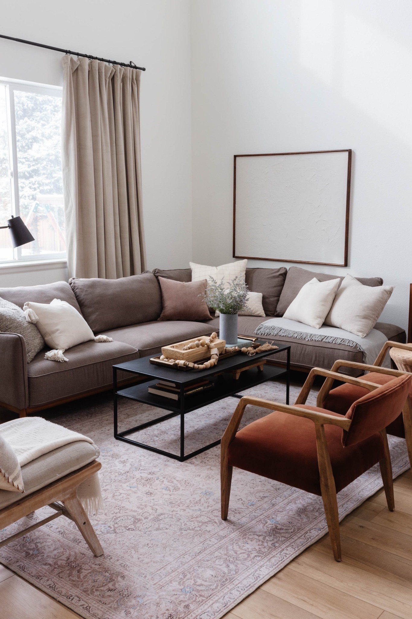 Use code PEGGYH15 for 15% off all full price Scout & Nimble Items | The Project Meadowbrook living room thoughtfully blends European elegance with a relaxed, welcoming feel—designed for a family who wanted both style and comfort. Layers of warm neutrals like cream, tan, rust, and brown create an inviting space, while black accents add depth and balance. And can we talk about those stunning rust velvet chairs? The perfect Parisian-inspired touch! 😍

Designer Tip: When decorating with neutrals, vary the textures to keep things interesting!

If you love this space, check out the full living room reveal on the blog! And be sure to shop all of our Project Meadowbrook Living Room picks on LTK. Tap below to shop!

#LTKHome
