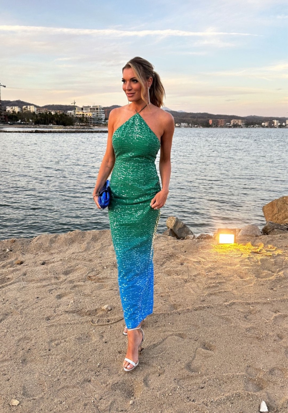 Lindsay Hubbard looks absolutely stunning in this sequined ombré blue and green dress by Sau Lee.  This would make the perfect wedding guest dress for Spring and  
Summer

It also comes in a short version with a feather trim 

It’s a little on the pricey side, so I’ve included a few from resale sites if you’d like to score a deal!