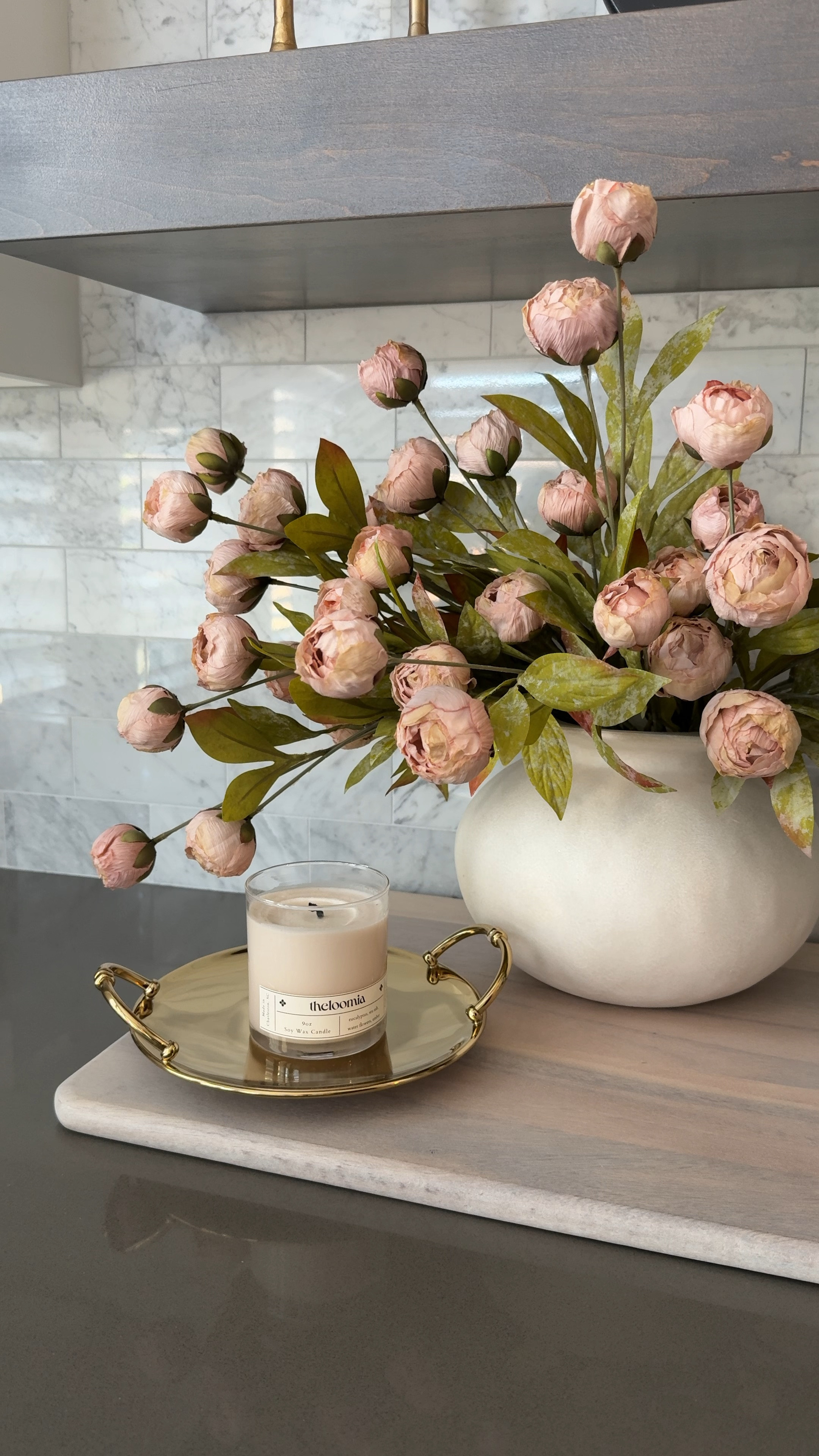 I just unboxed this stunning gold tray! I grabbed it during the site wide McGee & Co sale! I love the footed design and detail on the handles! 

My peonies are the tan color! They look more of a pink tone to me which is what I wanted! The cream color is currently in stock for delivery!

#LTKSeasonal #LTKHome #LTKWatchNow