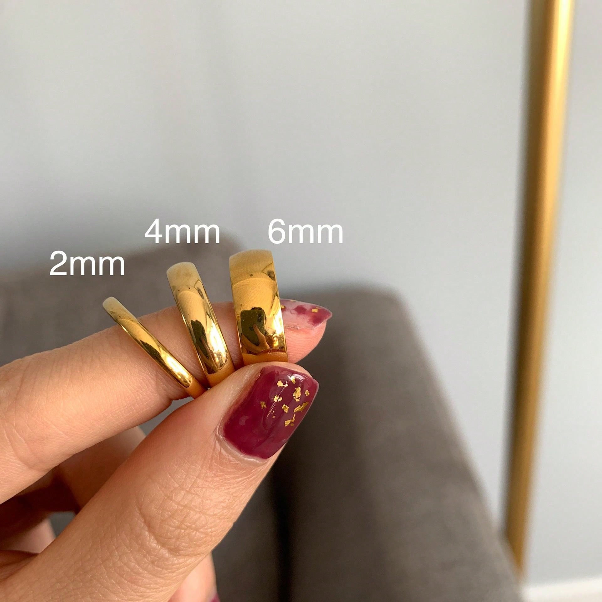 1pc Minimalist Glossy Titanium Steel Ring, 18k Gold-Plated Stainless Steel Ring That Can Be Worn Stacked. Suitable For Women, Men, Couples, Daily Wear. | SHEIN