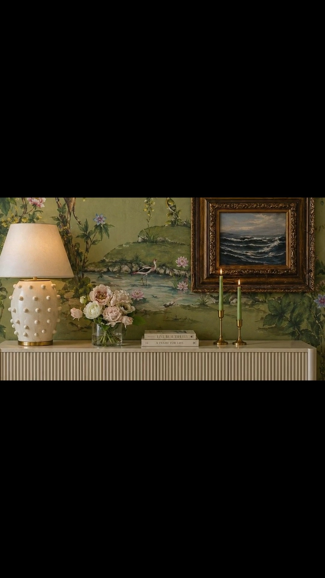 You’re home. ✨

As evening settles in, the soft glow of a sculptural table lamp and flickering taper candles turns the entryway into a warm, welcoming retreat. A timeless chinoiserie wallpaper creates an enchanting garden backdrop, while the fluted sideboard brings clean architectural texture and a modern classic balance. Finished with an intimate floral arrangement, framed art, and a soft geometric rug—because the feeling of home should begin the moment you walk through the door.

#Entryway #EntrywayDesign #EntrywayDecor #FlutedSideboard #Sideboard #ChinoiserieWallpaper #Wallpaper #TableLamp #SculpturalTableLamp #WallArt #FloralArrangement #TaperCandles #Candleholders #GeometricRug #ModernClassicHome #WelcomeHome

#LTKdayinmylife #LTKHome #LTKvlog