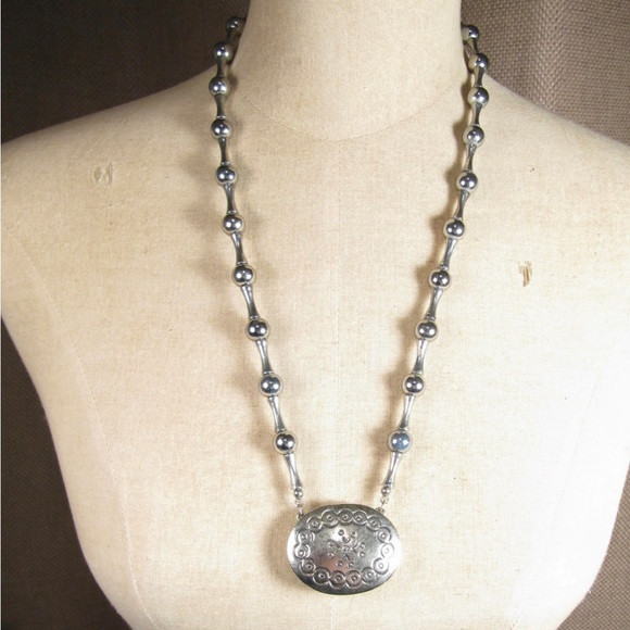 COPY1970’s ESTE LAUDER PERFUME NECKLACE.Silver ball &link design w/standard clip | Poshmark
