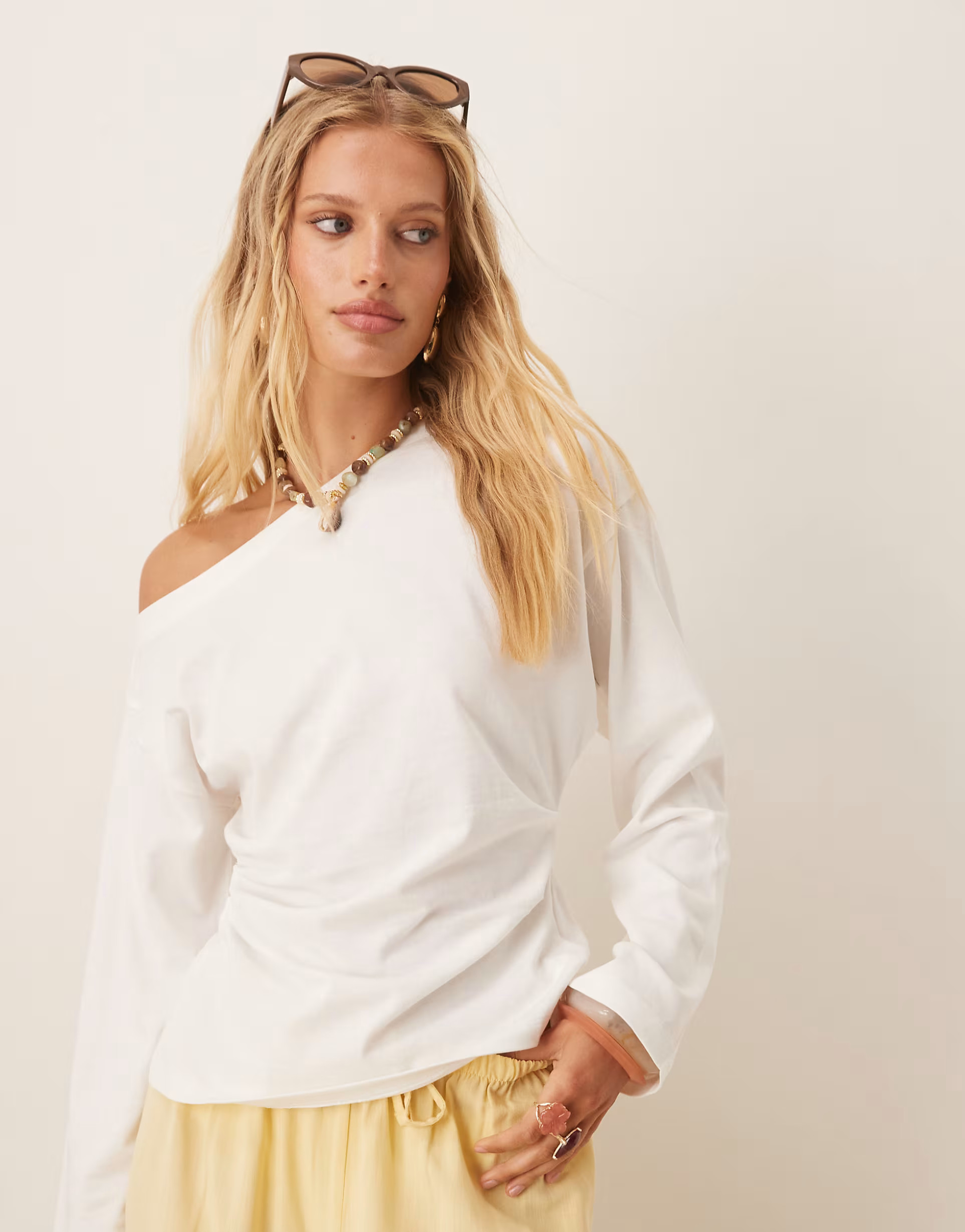 ASOS DESIGN long sleeve off-shoulder corset waist tee in cream | ASOS (Global)