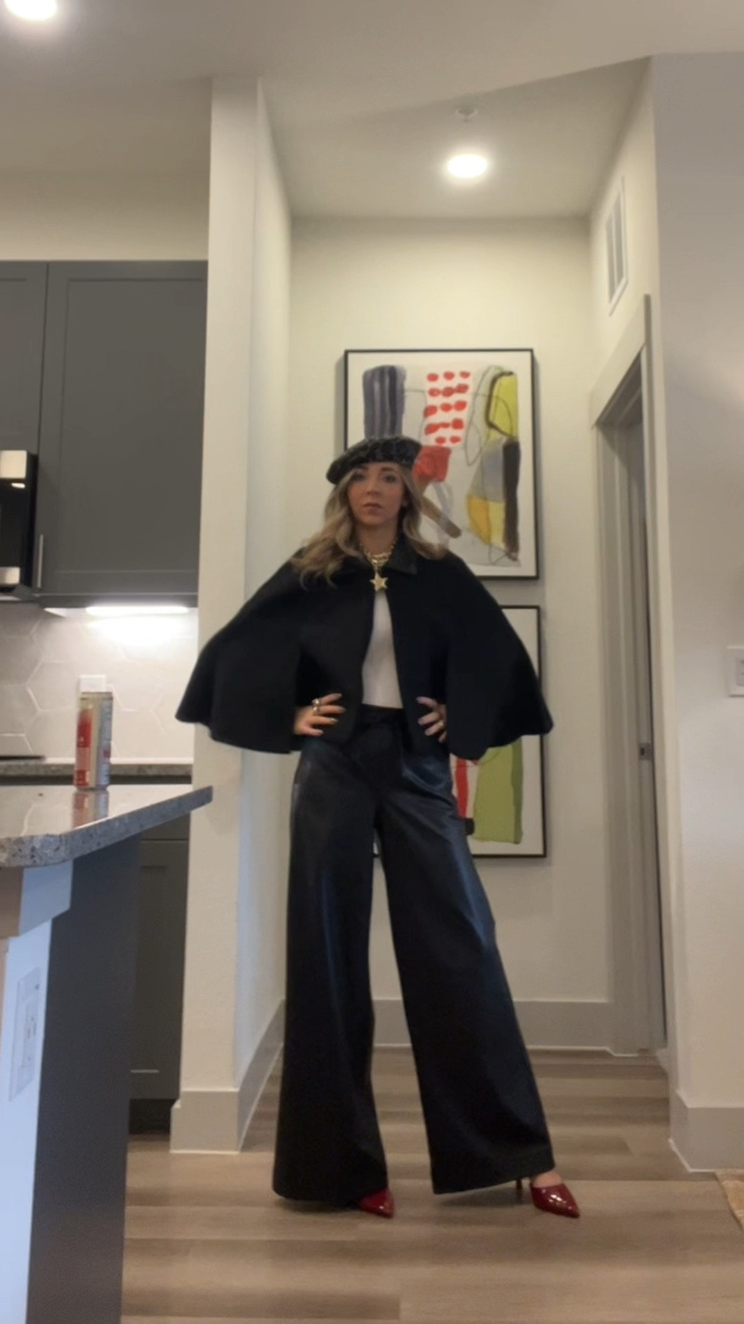 What I wore to work on this cold and rainy Monday… wool cape, white tank, leather pants, dark red heels, and topping it off with my jewelry stack and leopard beret

#LTKootd #LTKGiftGuide #LTKWorkwear