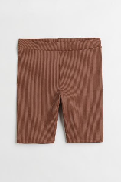 Bike shorts in ribbed cotton jersey. High waist with covered elastic at waistband.SizeThe model i... | H&M (US + CA)