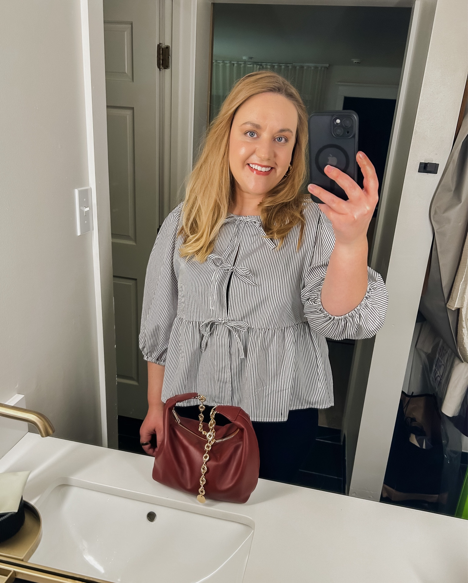 Date night outfit, black jeans, ankle, jeans, Old Navy jeans, black tank top, black cami, black and gold belt, burgundy purse, burgundy handbag, gold, hoops, gold earrings, bow front top, black and white top, tie front top, target top, work outfit, work style 

#LTKMidsize #LTKFindsUnder50 #LTKWorkwear