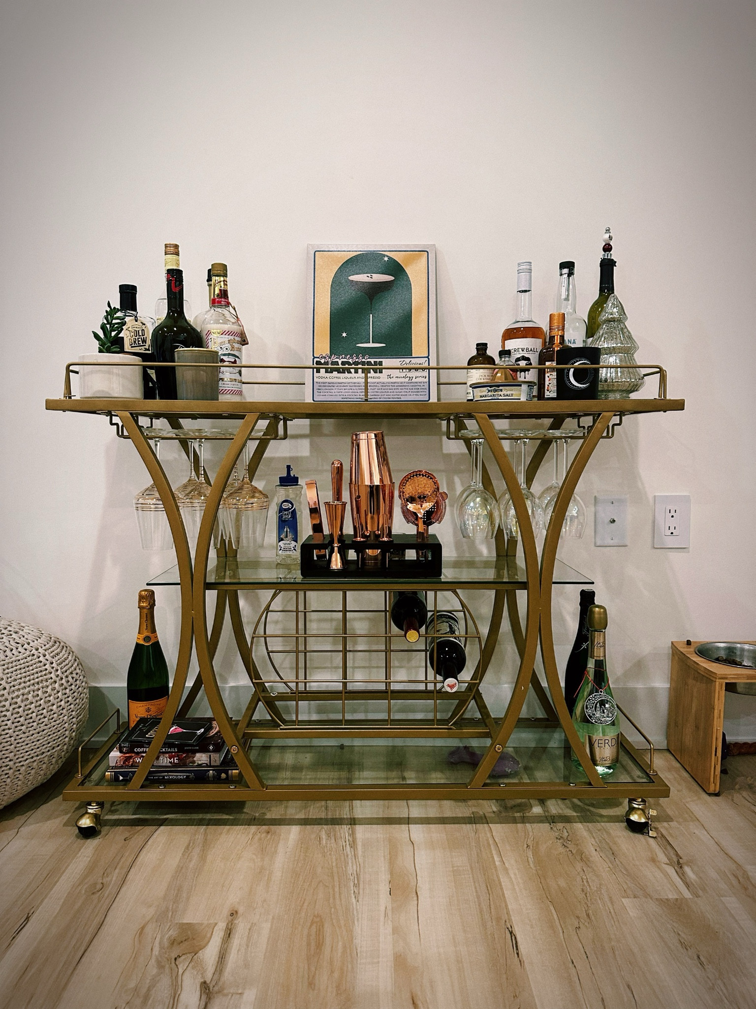 Gold three tiered home bar cart with glass shelves and wine rack 

#LTKparties #LTKhome #LTKSeasonal