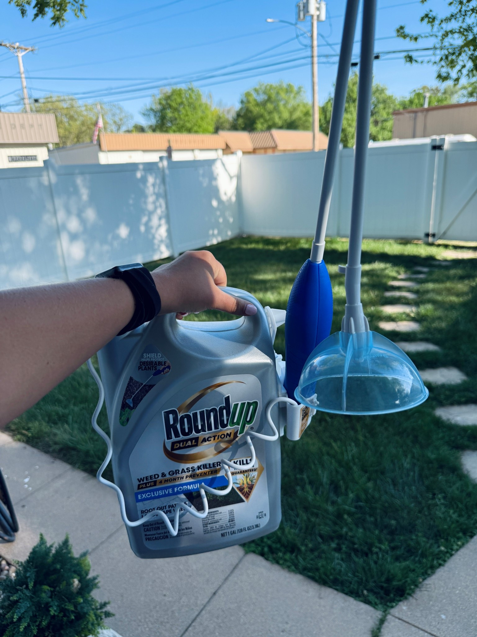 I spray this weed & grass killer on my sidewalk cracks & along my house in my landscaping rocks to keep everything looking nice. This stuff is so easy even I can use it! ;) 

 