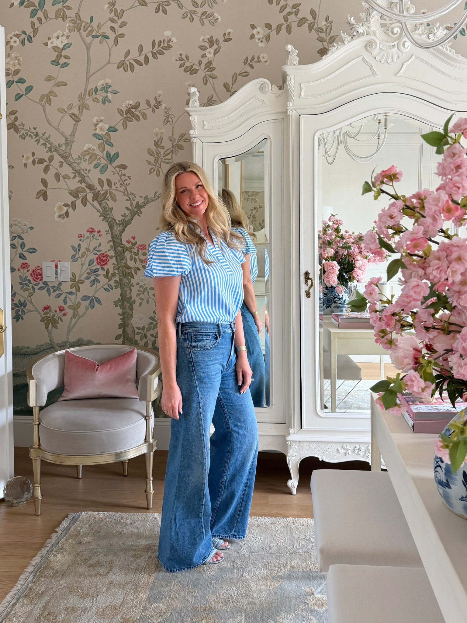 Spring outfit! Love this blue striped top and wide leg jeans! Wearing a small in the top and my normal size in the jeans.

#LTKootd #LTKOver40
