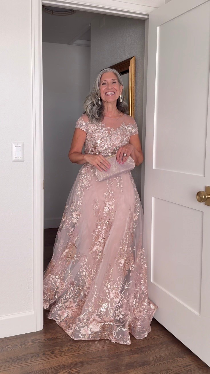 🌸 the ball gown that photographs beautifully from every single angle.

A dusty rose cap sleeve illusion neckline ball gown with 3D florals, rhinestones and sequins from the waist to the floor.

Use code EMPTYNEST for 10% off at Lara.com (most styles available from petite to plus).

I’m in a size 4 and the fit is beautiful.

Wedding Guest Dress | Fashion over 50 | Mother of the Bride | Mother of the Groom | Black Tie | Formal Gown | Summer Wedding | Dresses to Hide Belly | Special Occasion | Wedding Guest Dress with Sleeves

#LTKSeasonal #LTKOver40 #LTKWedding