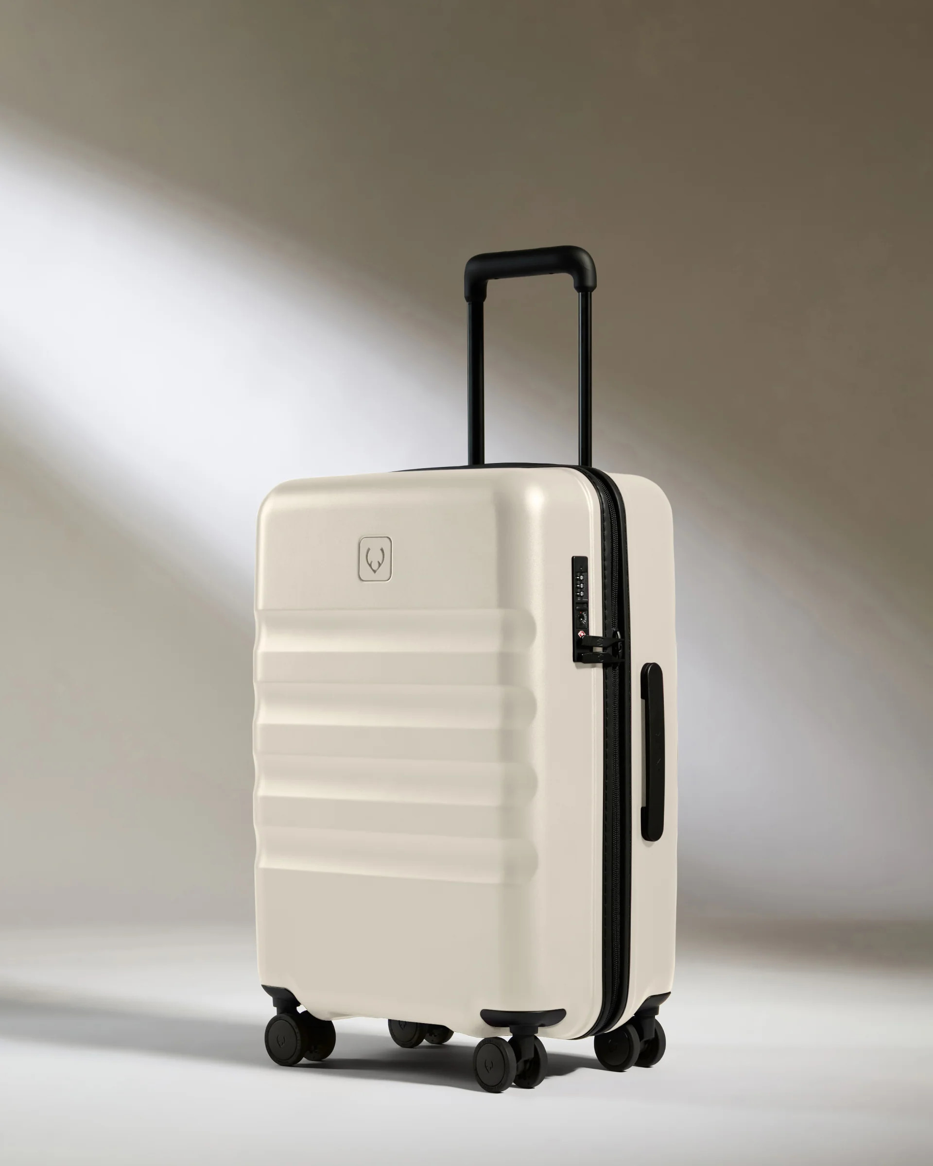Large Carry-on Luggage in Taupe - Icon Stripe | Lightweight & Hard Shell Suitcase | Antler USA
