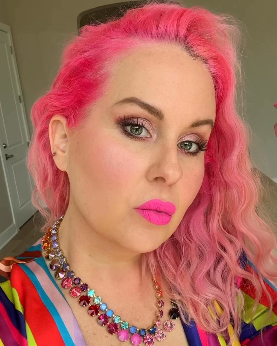 I enjoy being who I am at 51 with pink hair 🩷 Women are constantly bombarded with messages about what beauty should look like. Beauty comes in all shapes, sizes, and ages, and true beauty is about being confident and comfortable in your own skin. 

I created soft waves  by using the   Mermade Hair Double Waver. I love this hair tool! My hair does not hold a curl so I was surprised this worked! I started by using the Blow dry brush with heat protector spray , then the double waver. 

#pinkhair  #pinklipstick #makeup  #maccosmetics  #mermadehair #curls #hairtools 

#LTKOver40 #LTKStyleTip #LTKBeauty