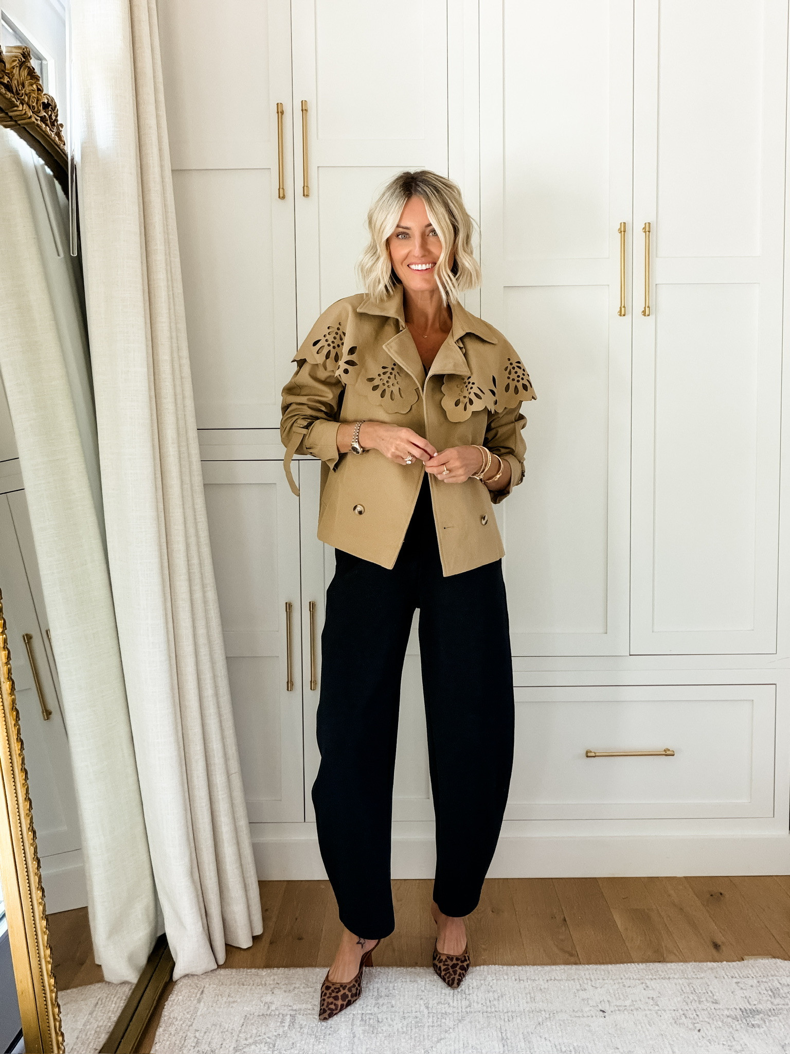 This jacket looks like something you'd buy from Anthropologie! Love the eyelet cape detail on this! Wearing S in jacket & XS in pants! 

Loverly Grey, fall fashion, fall outfit inspo, black pants, barrel pants, trench coat, fall jacket, fall workwear, chic looks 

 #LTKootd #LTKSeasonal #LTKWorkwear