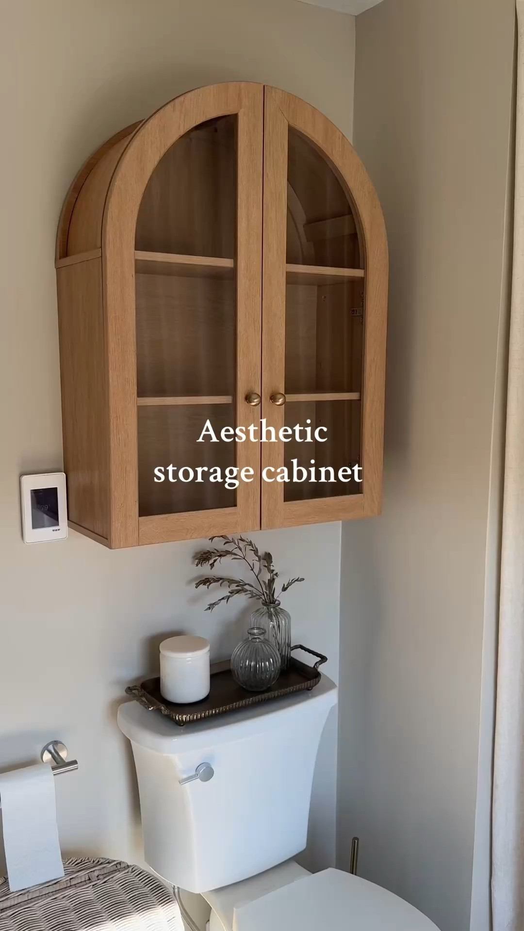 On sale with a $30 off coupon! My house is small so I am always looking for pretty storage solutions. This cabinet is so pretty over the toilet or honestly anywhere! I prefer it with the privacy film but if you get some cute baskets to put in it the glass would be nice too! I did swap the black knobs that it comes with for my fav gold ones but I linked it all! And similar options.

#LTKHome