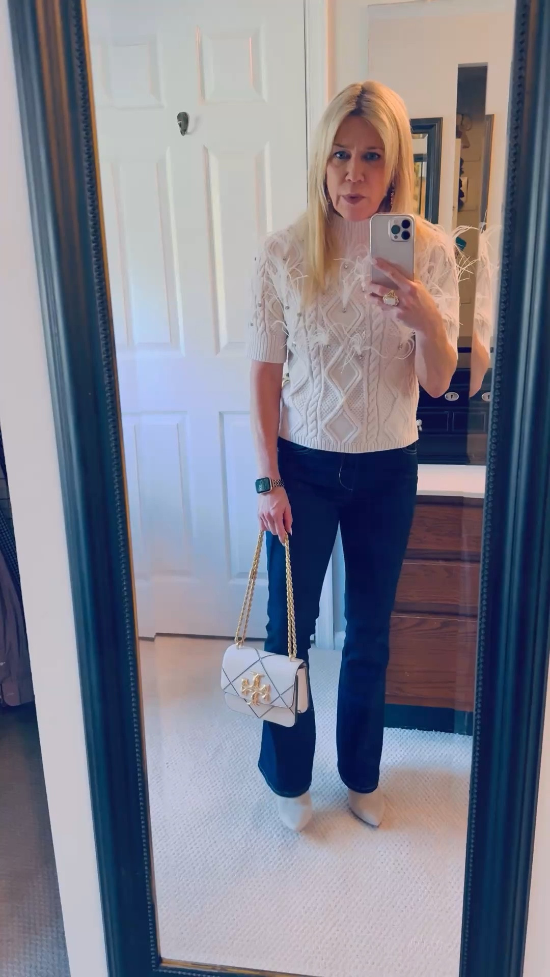 Love the neutral pop of fun with this feather crystal embellished sweater, bootcut dark blue denim with rhinestone button, neutral fur trim booties and this Kate Spade handbag. Ring and earrings are from a Paris boutique.

#LTKPetite #LTKootd #LTKOver40