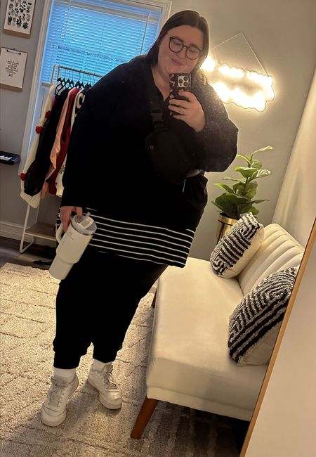 Plus size travel day outfit idea! Wearing a pair of Athleta Salutation Joggers in a size 3X, a tunic length oversized t-shirt from Old Navy in a size 4X, a quarter zip fleece pullover from Target in a size 4X, a pair of my favorite crew socks, and my trusty Reebok sneakers. 

#LTKcurves #LTKstyletip #LTKFind