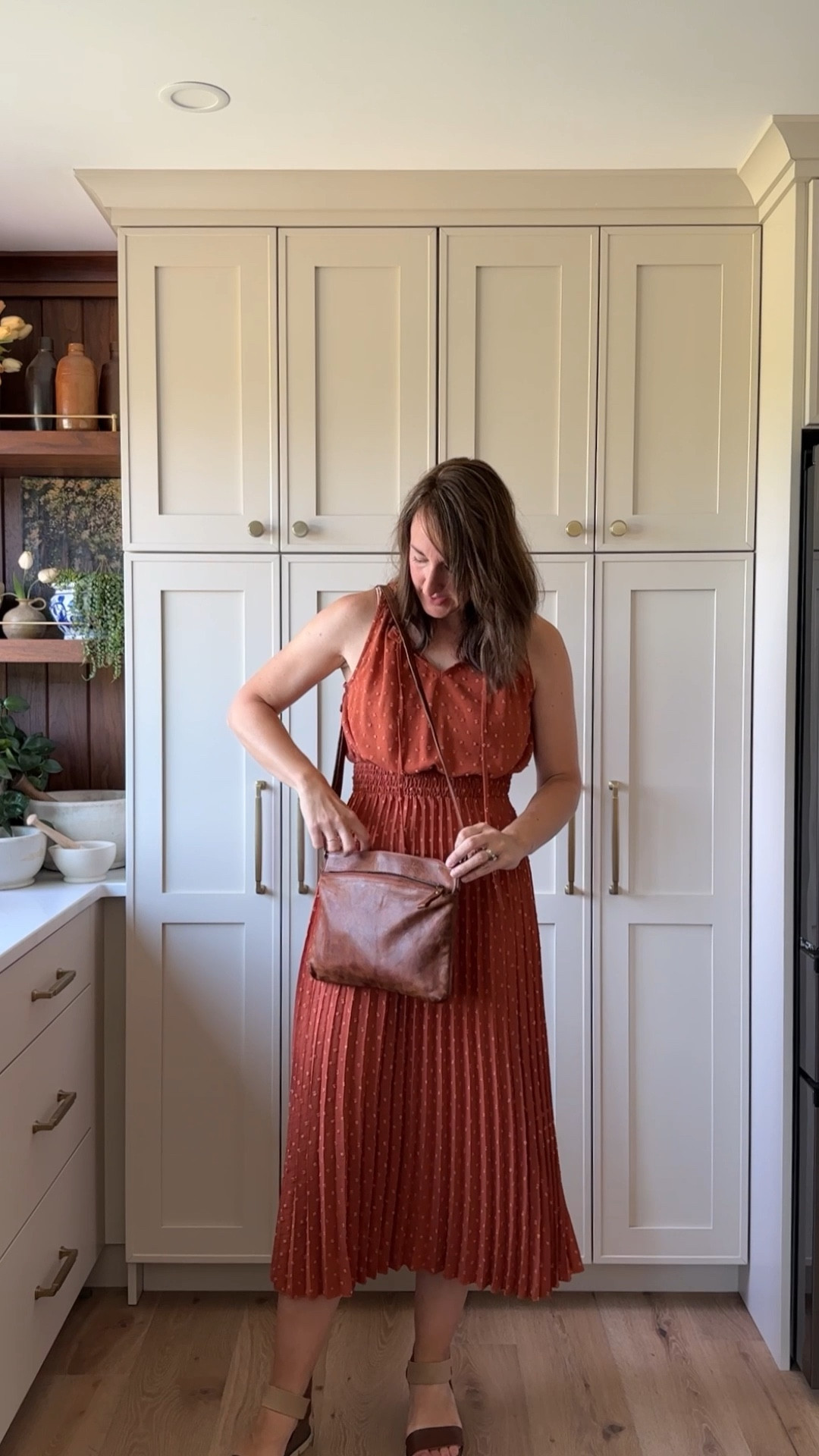 Love this burnt orange dress to span the seasons into fall. Pair with leather wedge sandals and a real leather cross body purse for an easy look! 
Purse is Color Tan-7
Dress is color brick red
Sandals are older but linked the newest version! 

#LTKFindsUnder50 #LTKFindsUnder100 #LTKOver40