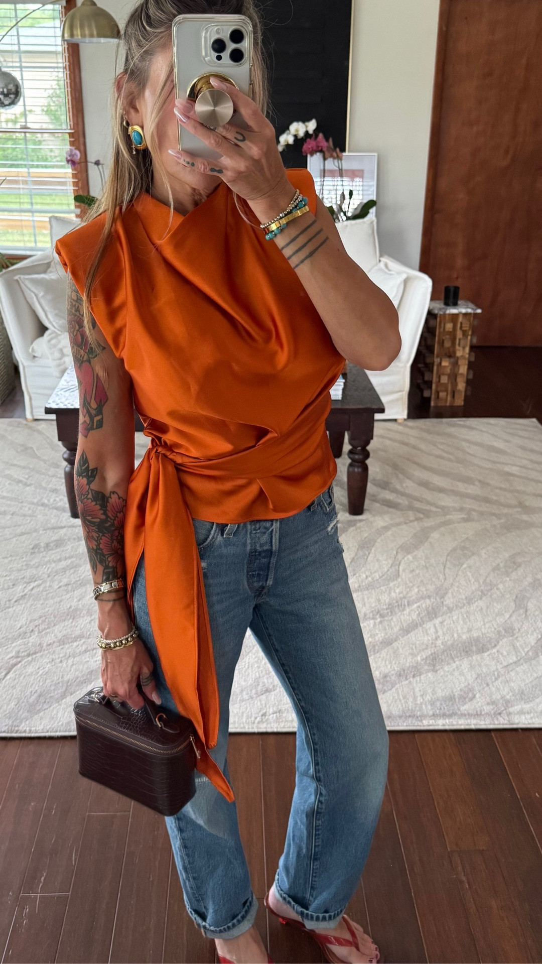 Top in a small. Jeans sized down (24x30) verified vintage wash and I’m 5’1”.
Lip is color main character.