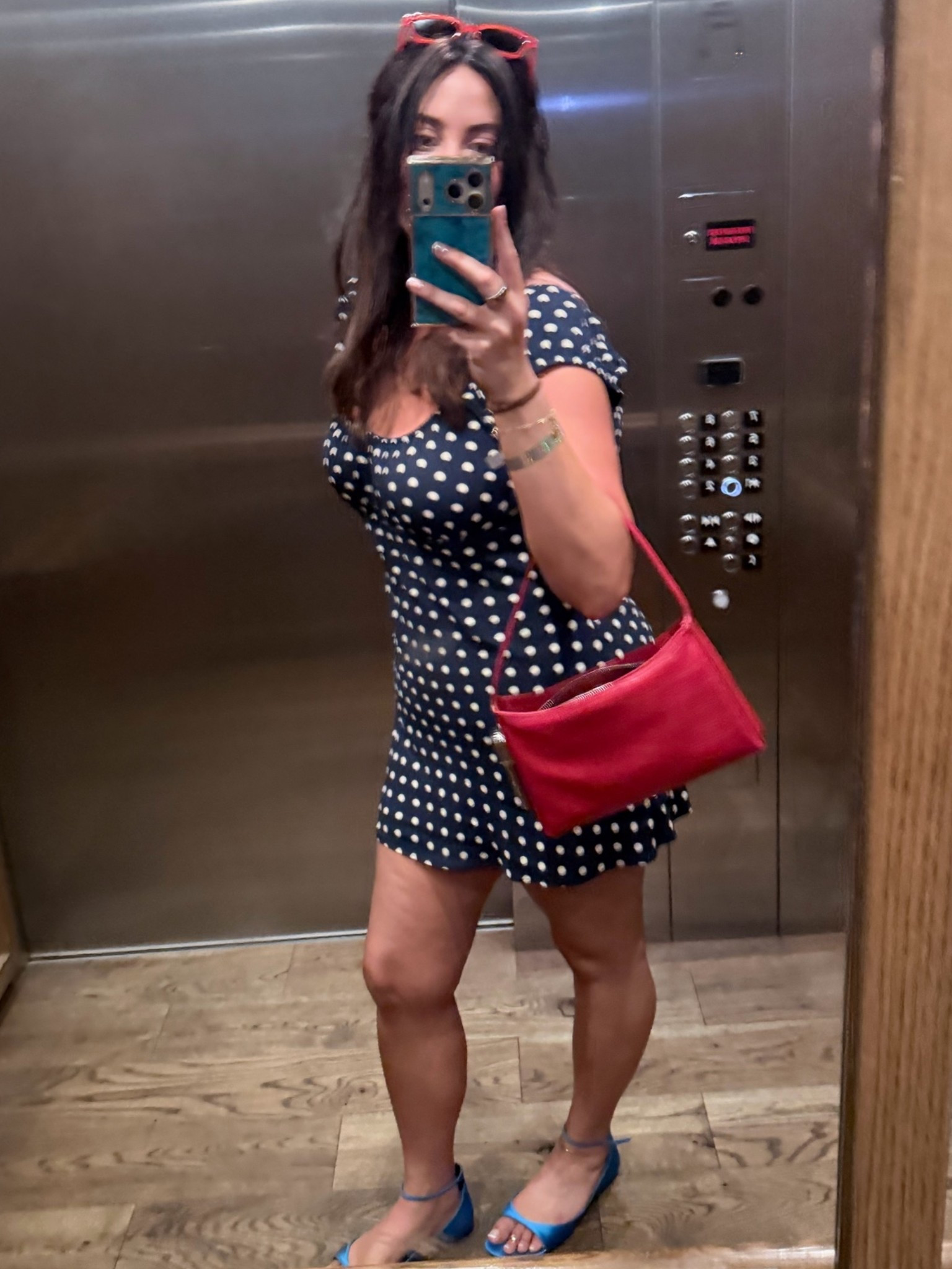 Dress runs short so I added navy spandex under! I’m in a size 12. Wearing Victoria’s Secret Demi bra.