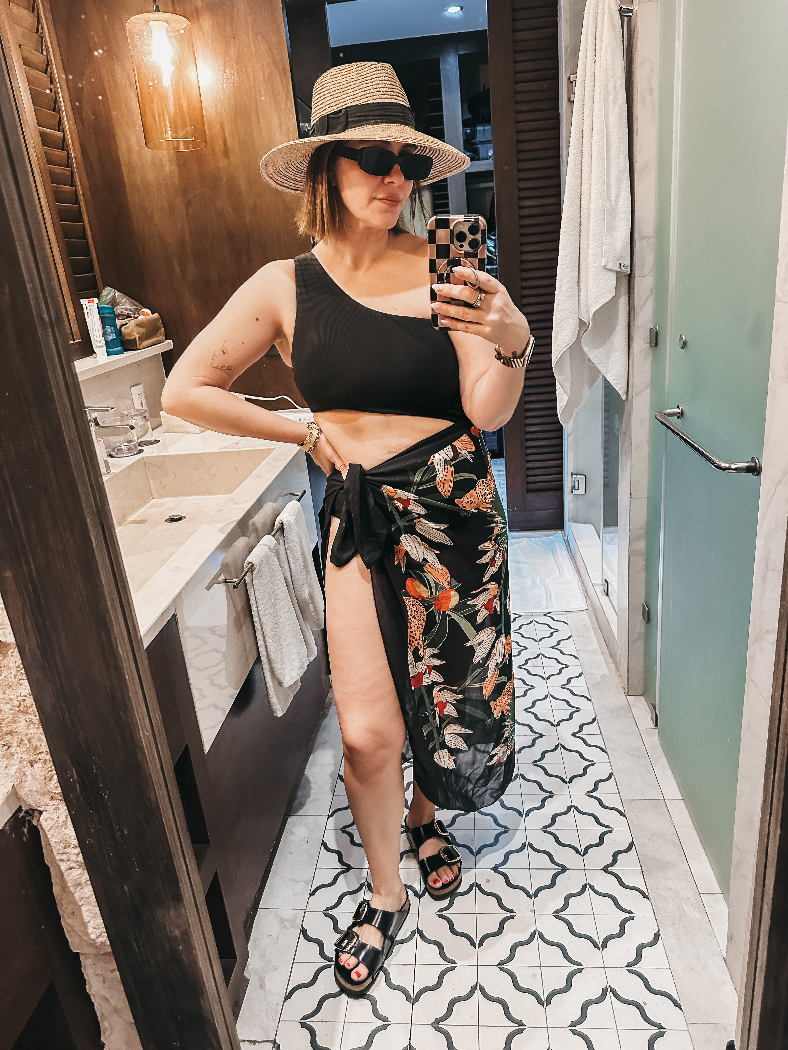 All of the bathing suits I wore while I was in Mexico. A lot I've had for a while...they are so good! One shoulders are a medium, Burgundy is a medium bottom and 36D top, printed one is a medium, the printed one piece is an 8 

 #LTKOver40 #LTKMidsize #LTKTravel