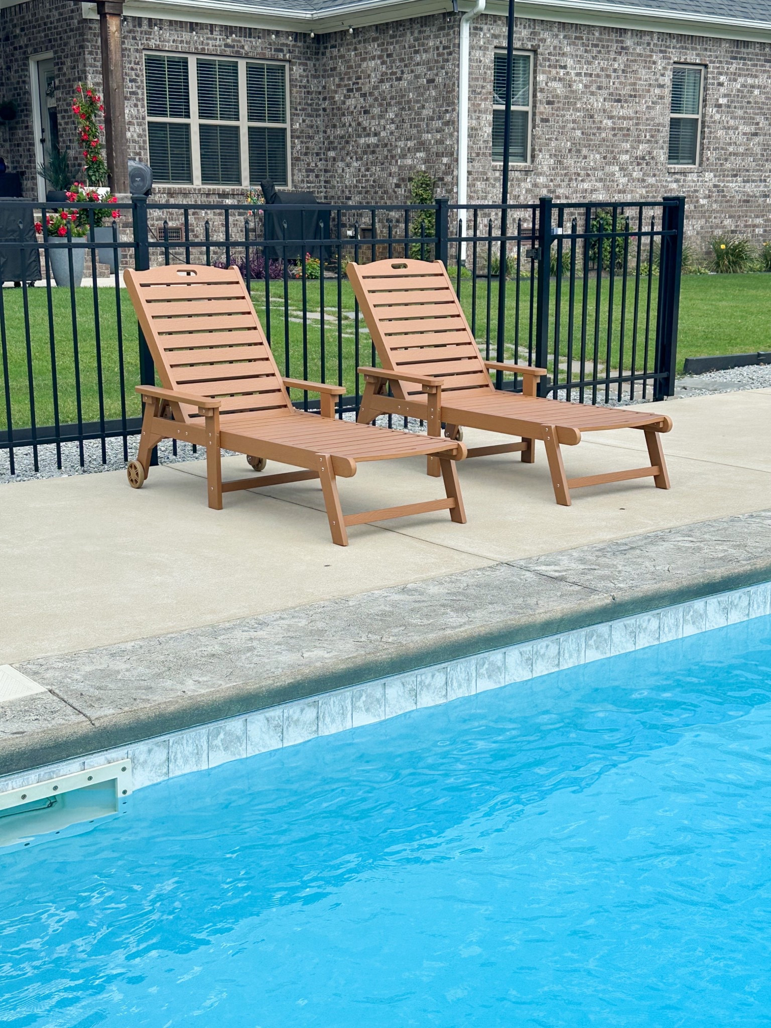 Outdoor chaise loungers 
On a budget 
Faux wood pollywood 

#LTKHome #LTKSeasonal #LTKSwim