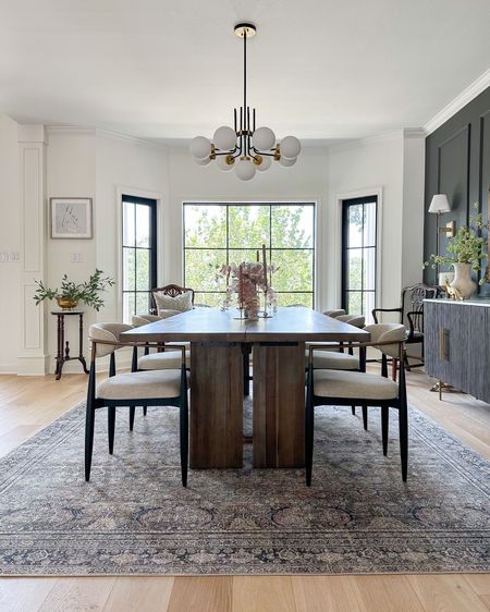 Dining room views — Crate & Barrel wood dining table, Arhaus jagger chairs, Arhaus dupe dining chairs, Loloi Layla rug, modern black and gold chandelier, buffet, dining table decor

#LTKhome #LTKstyletip #LTKsalealert