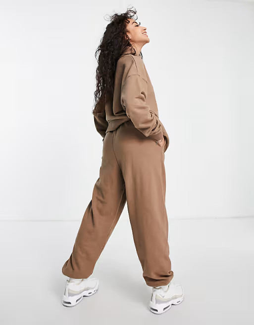 Chelsea Peers Petite oversized sweat and jogger set with woven logo tab in taupe | ASOS (Global)