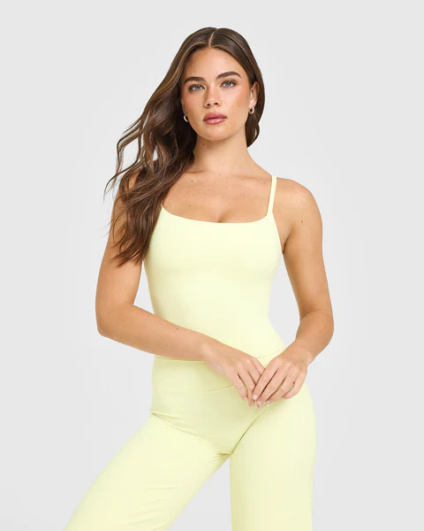 SoftMotion™ Strappy Mid Vest with Built in Bra Shelf 
 Pastel Yellow | Oner Active (UK / US)